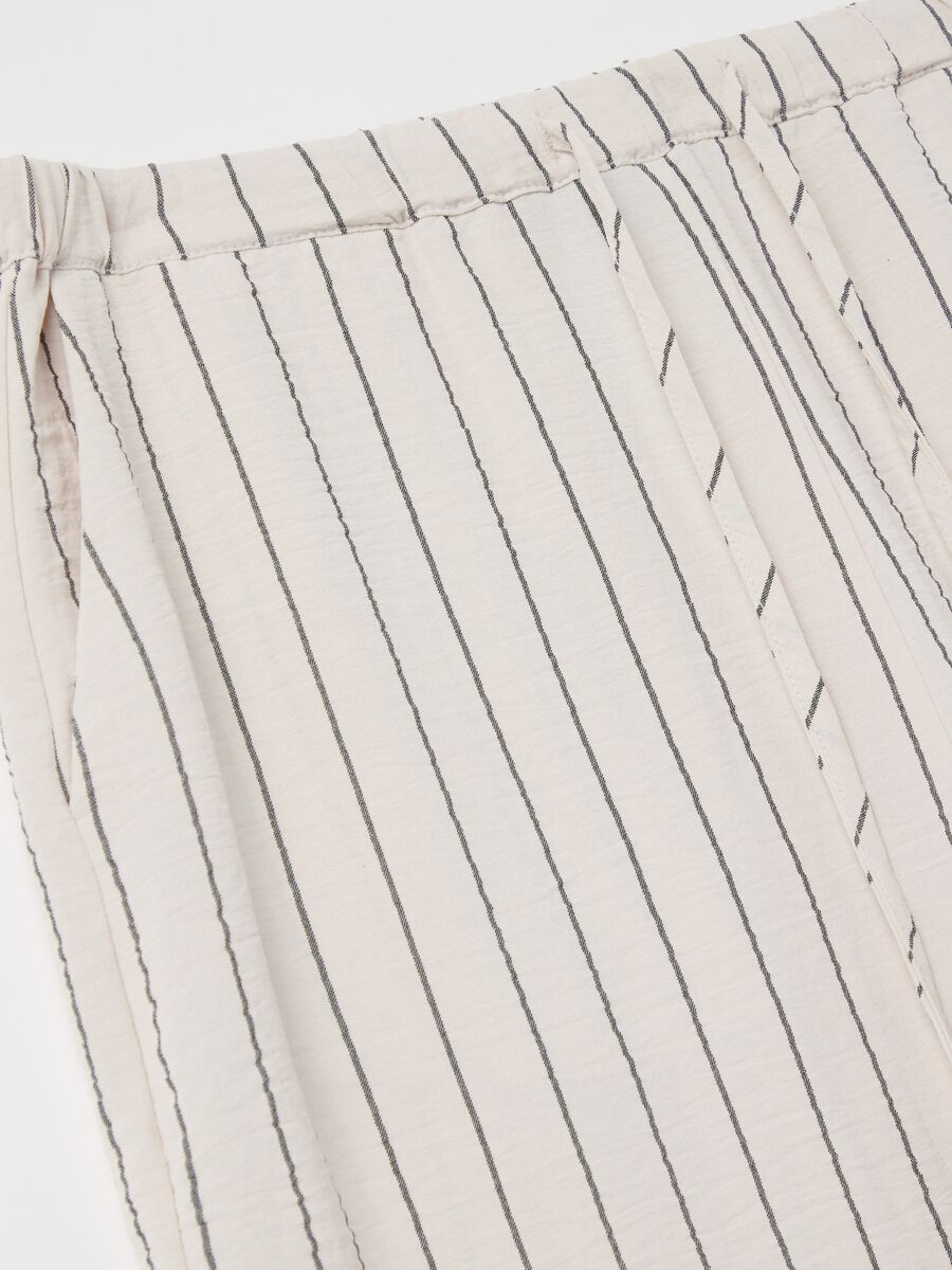 Crinkle-effect fluid trousers_5