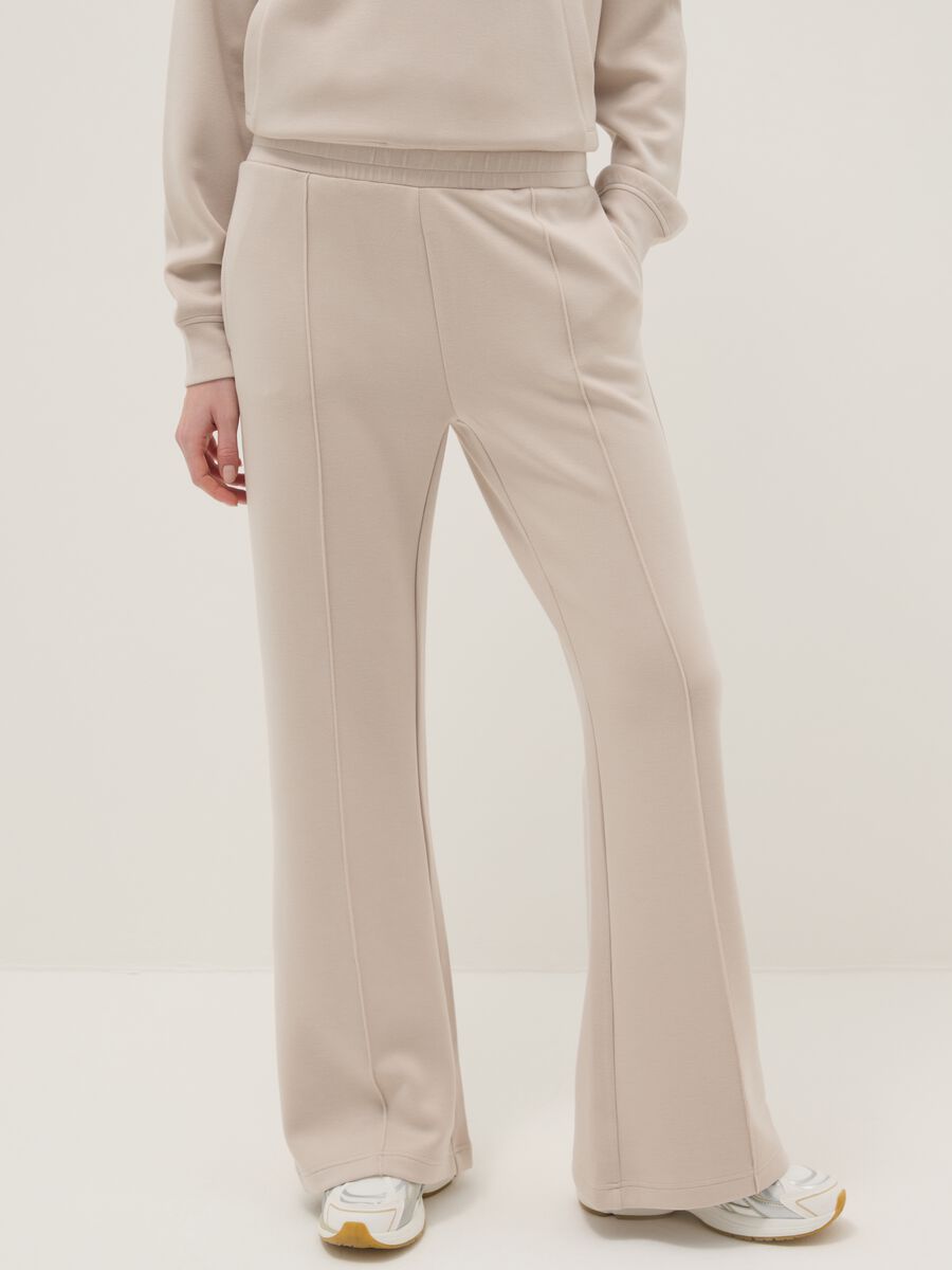 Beige wide leg trousers in stretch modal blend_1