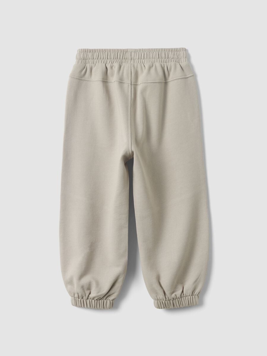 Pantaloni jogger grigi in puro cotone organico per bimbo_1