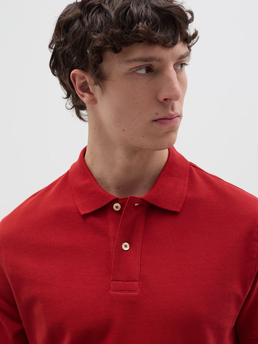 Solid colour polo shirt in organic cotton_2