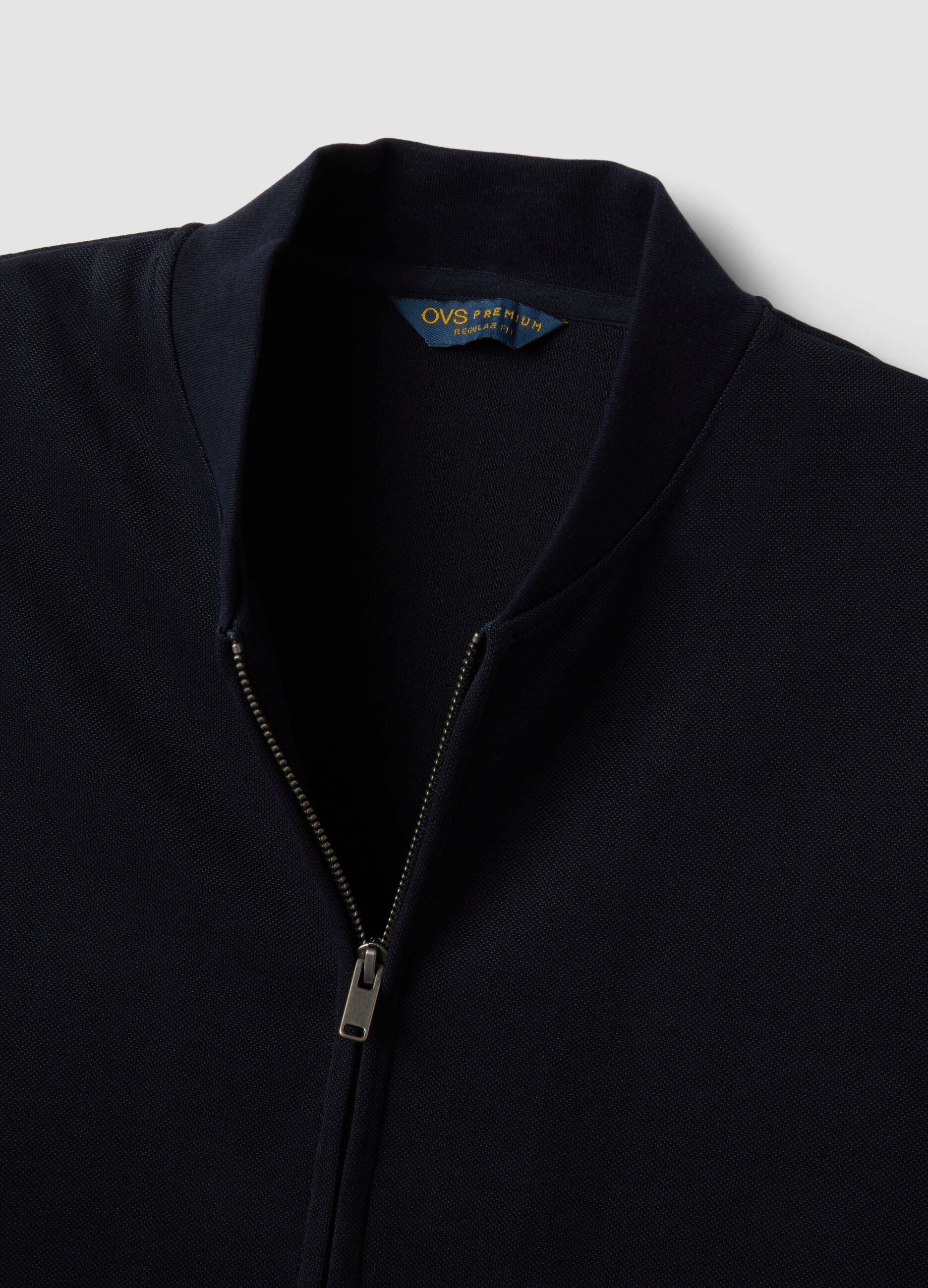 Navy full-zip sweatshirt in stretch piqu&eacute; with ribbed collar