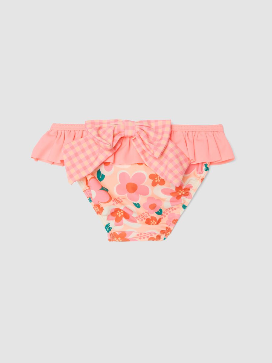 Pink stretchy fabric swim briefs with ruffles for baby girls_1