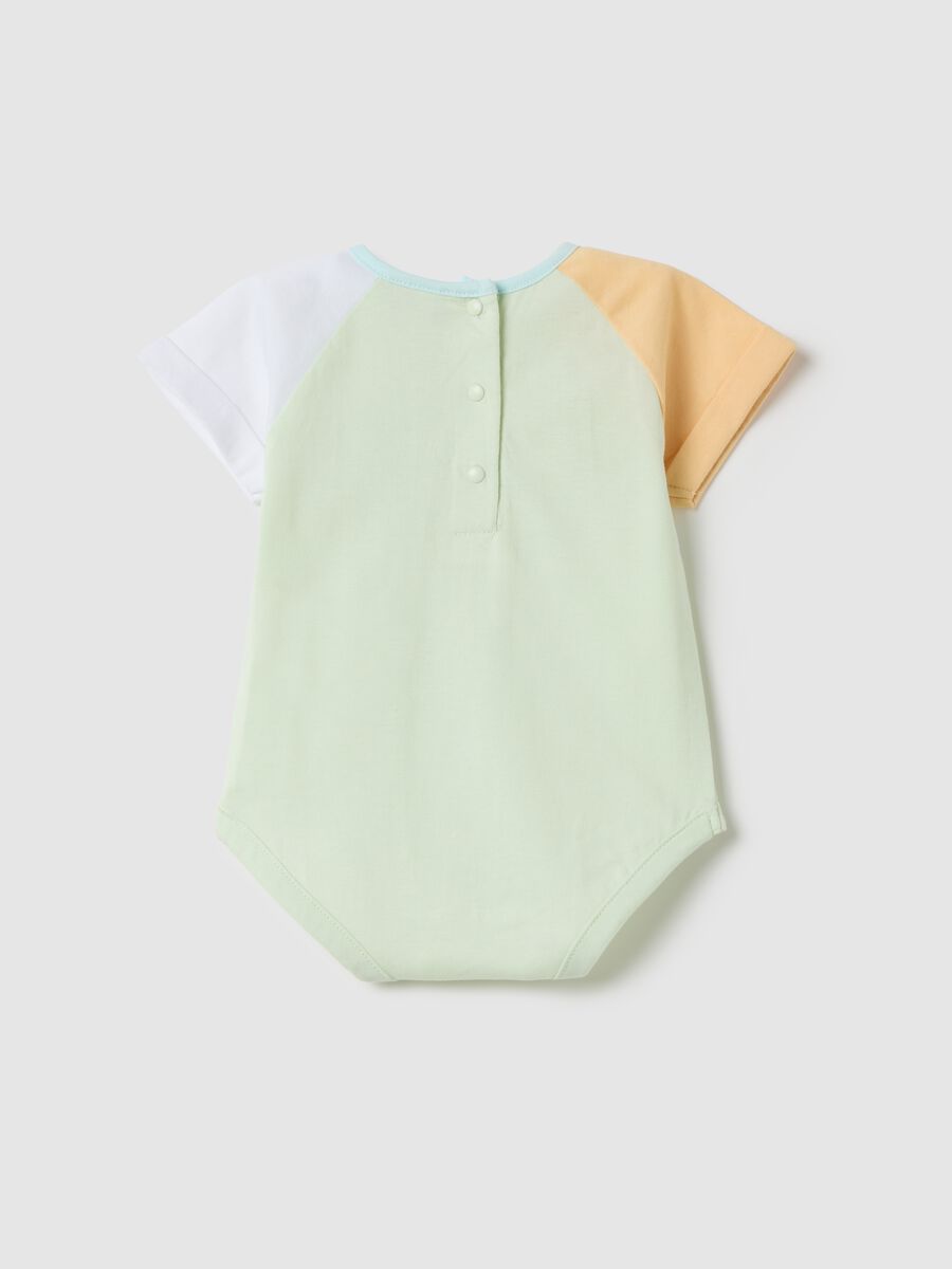 Green and orange colourblock bodysuit in organic cotton_1