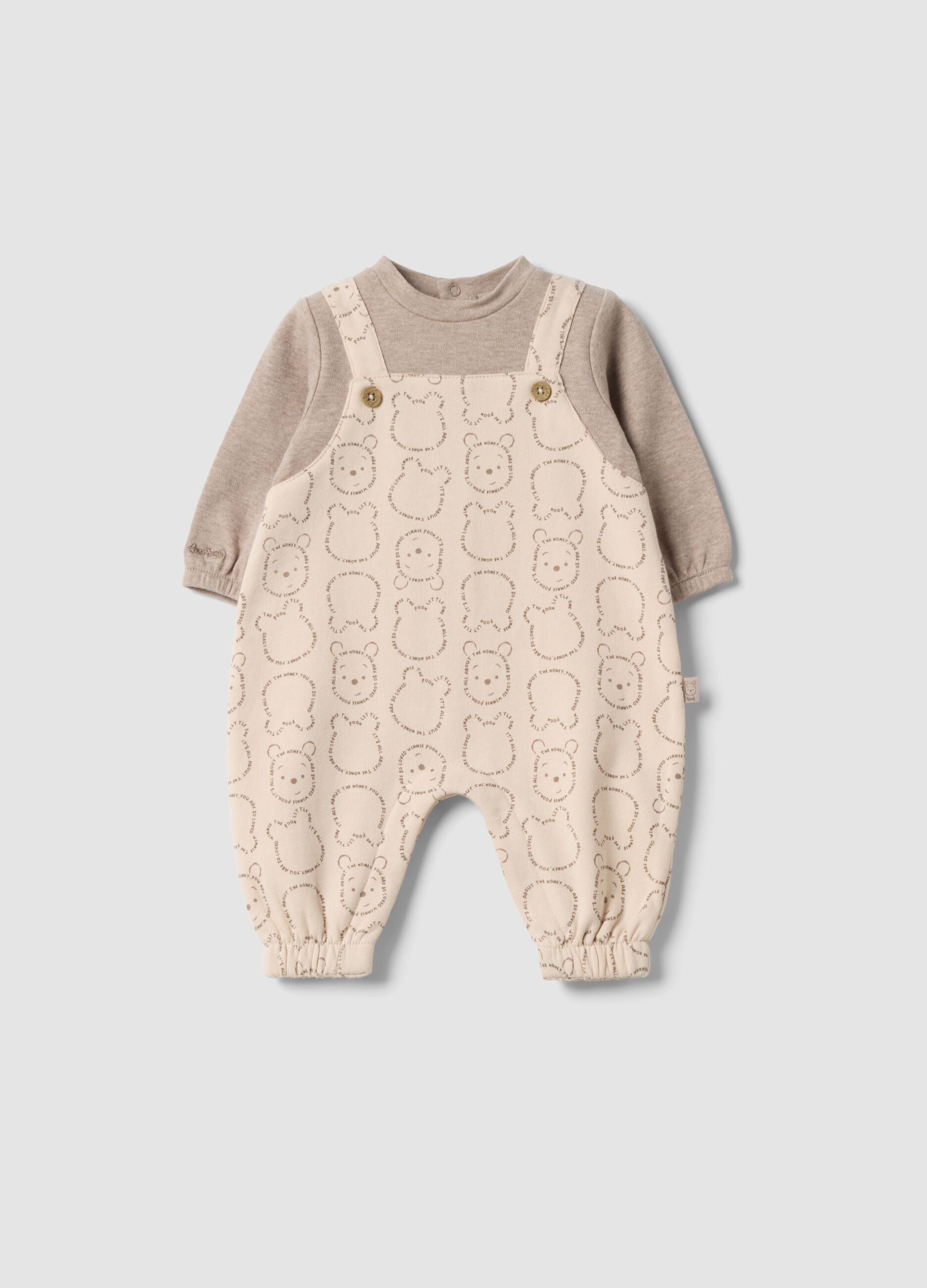 Grey organic cotton sleepsuit with Winnie the Pooh print