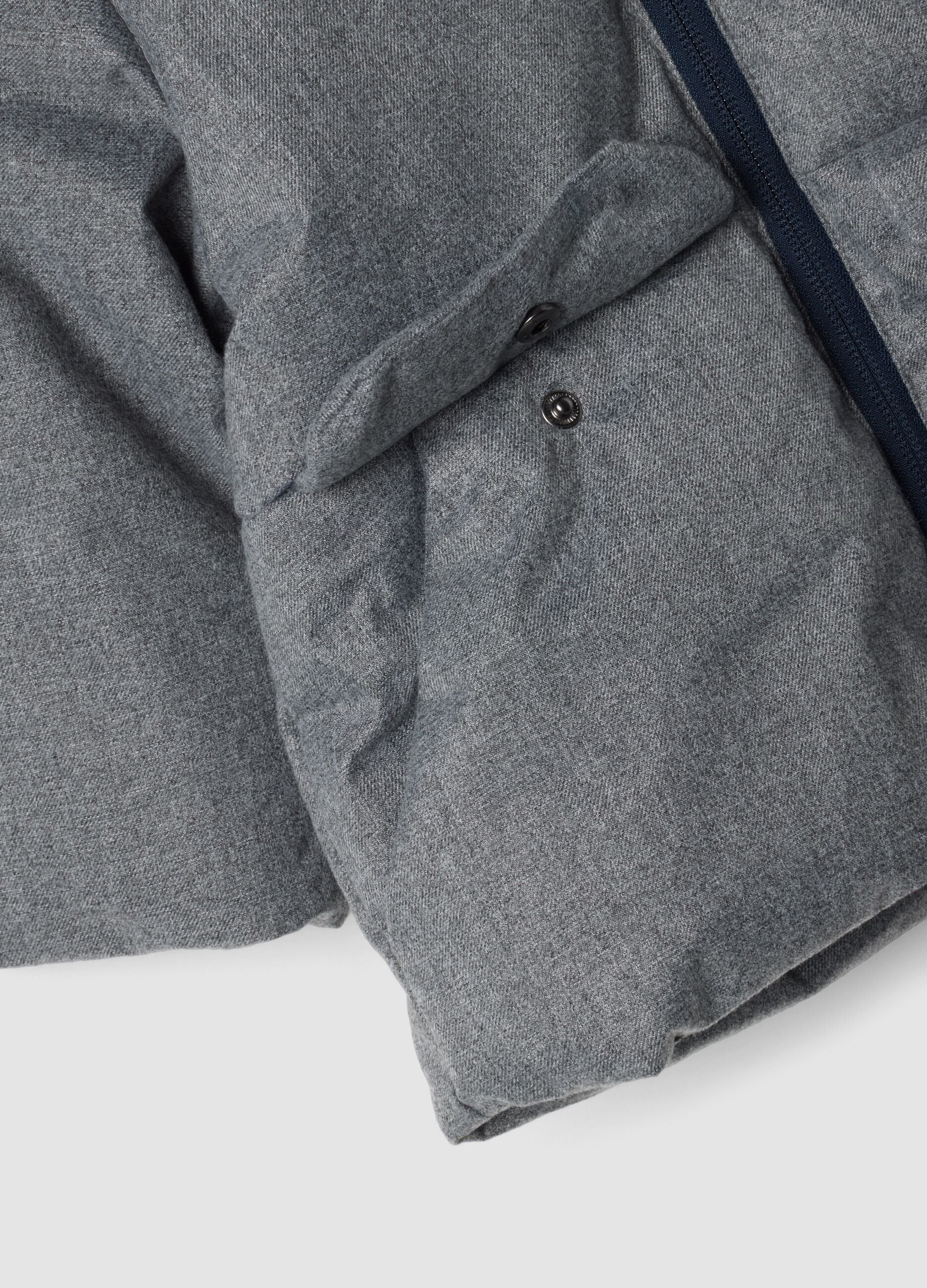 Long grey padded jacket with hood and zip