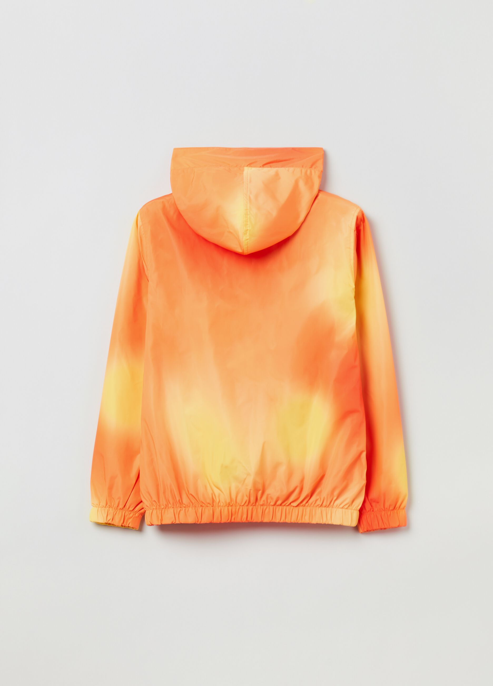 Waterproof jacket in tie dye pattern.