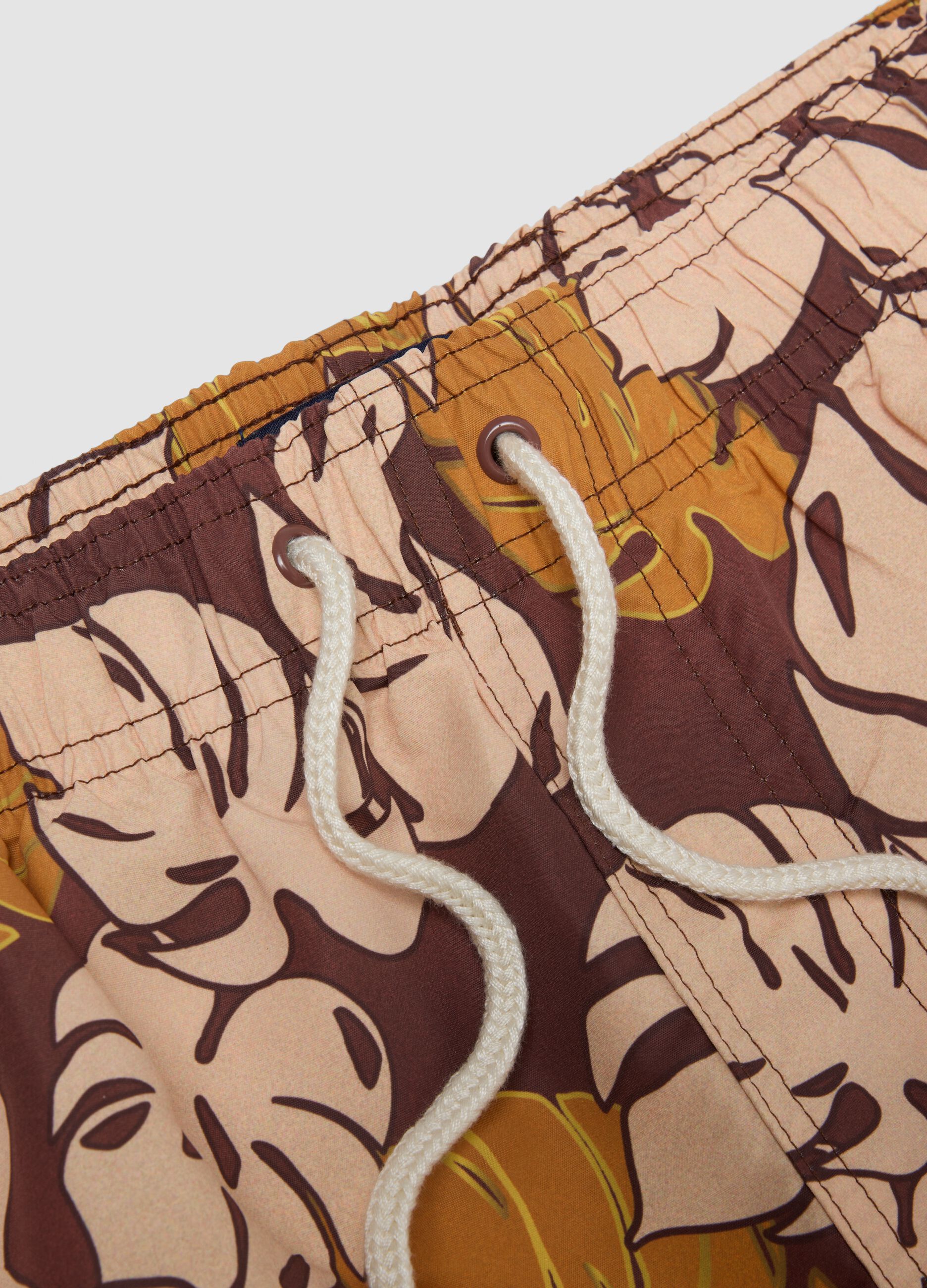 Brown tropical-print swim shorts