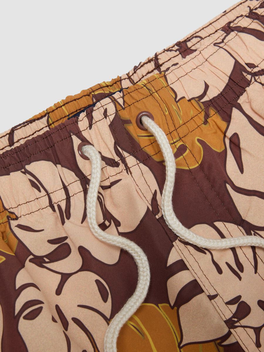 Brown tropical-print swim shorts_1