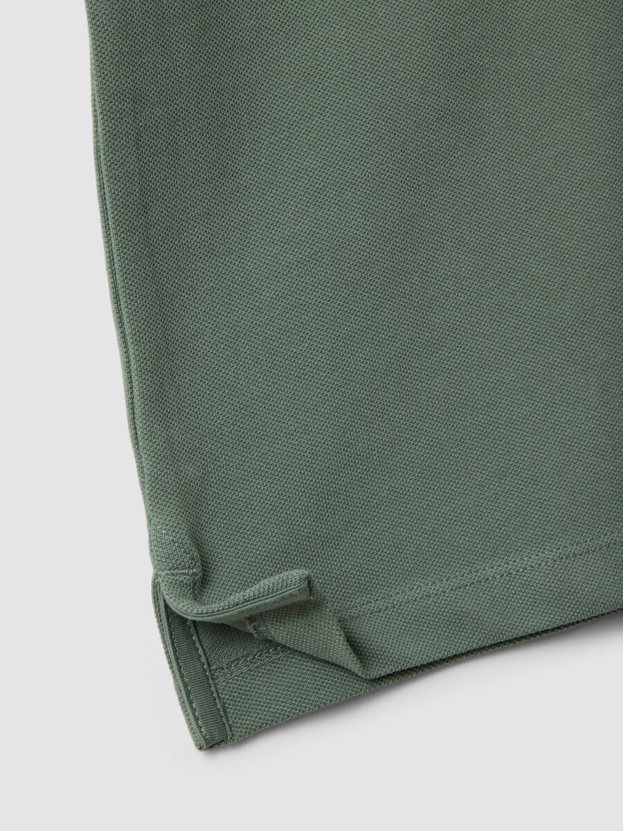Green short-sleeved polo shirt in pure organic cotton_1