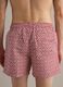 Red swim shorts with geometric print_3