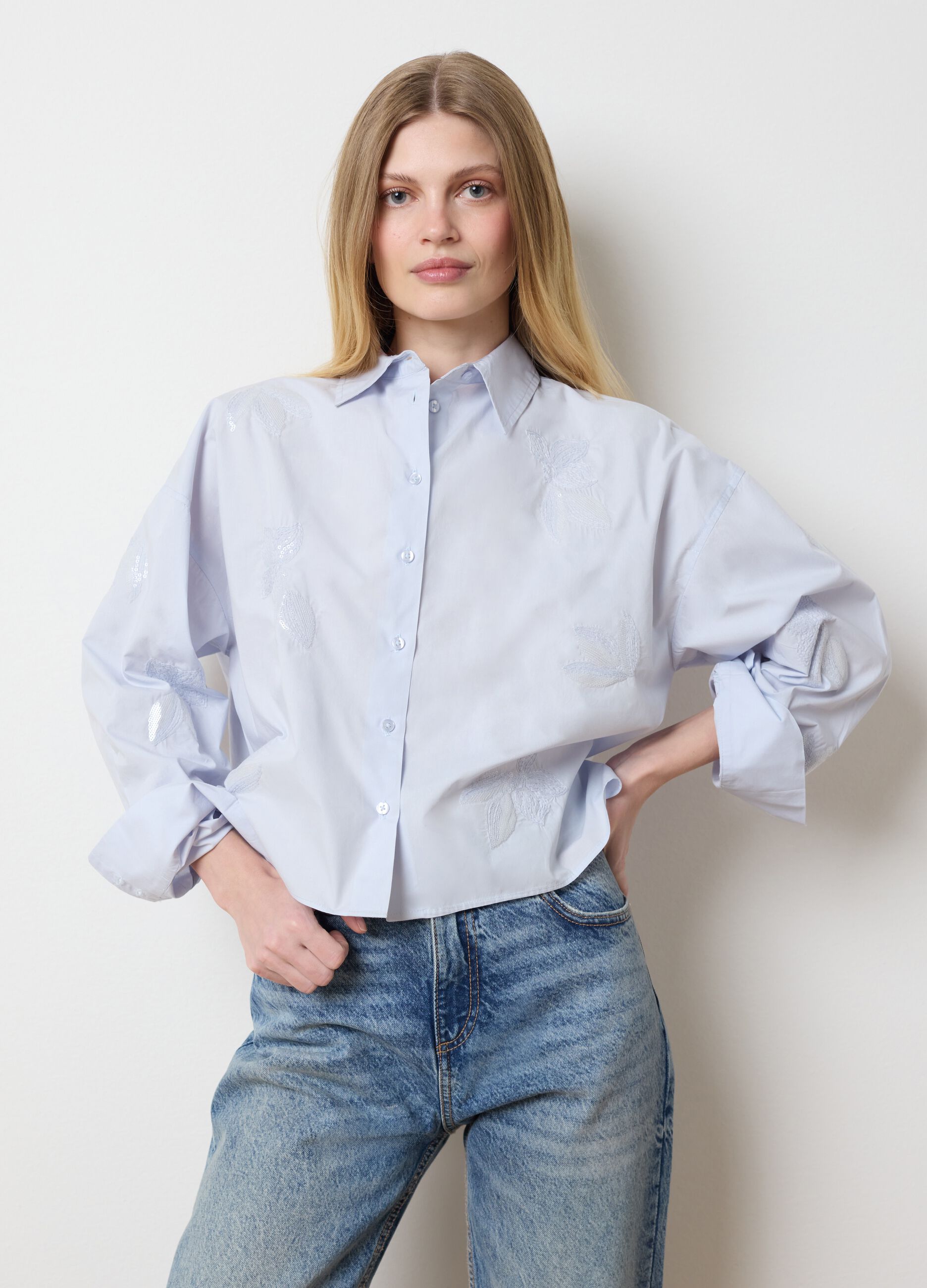 Light blue cropped shirt with floral embroidery