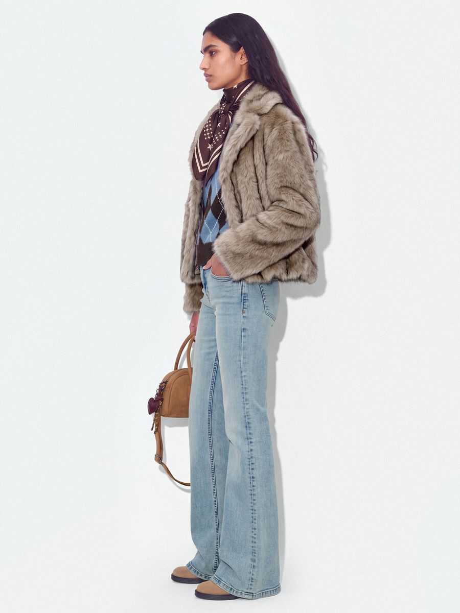 Jeans blu chiaro flare in cotone elasticizzato_0