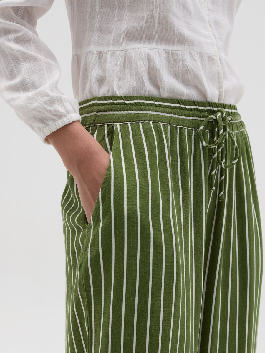 Striped green palazzo trousers in viscose and linen_2