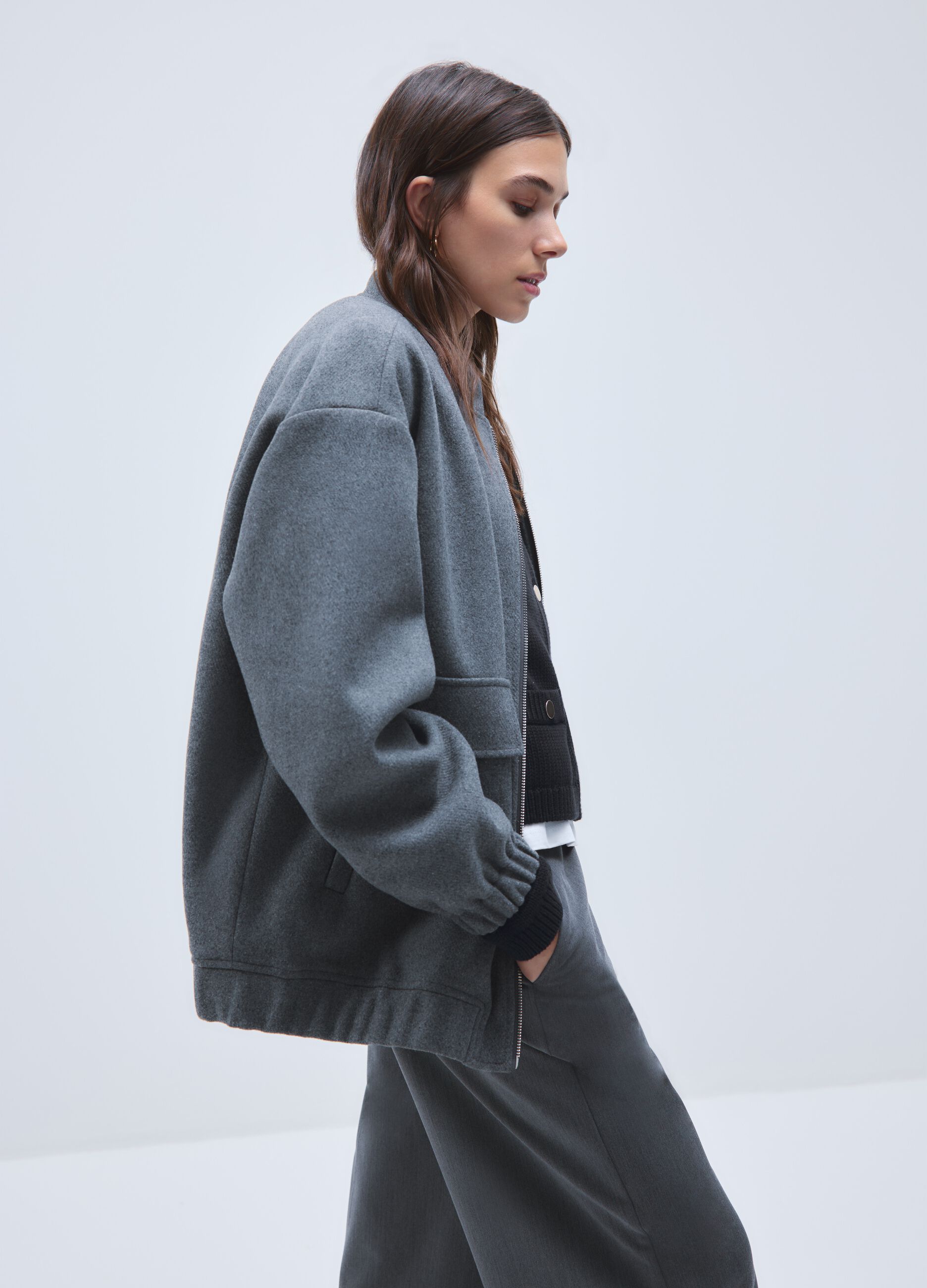 Grey zip-up jacket with oversized fit