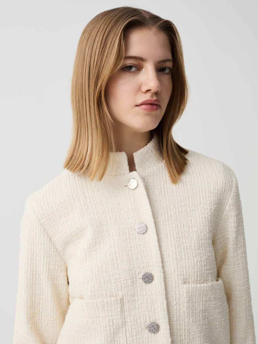 Short jacket in lurex with raised weave_1