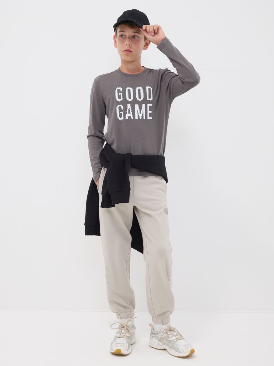 Pantaloni jogger grigi in puro cotone over fit per ragazzo_0