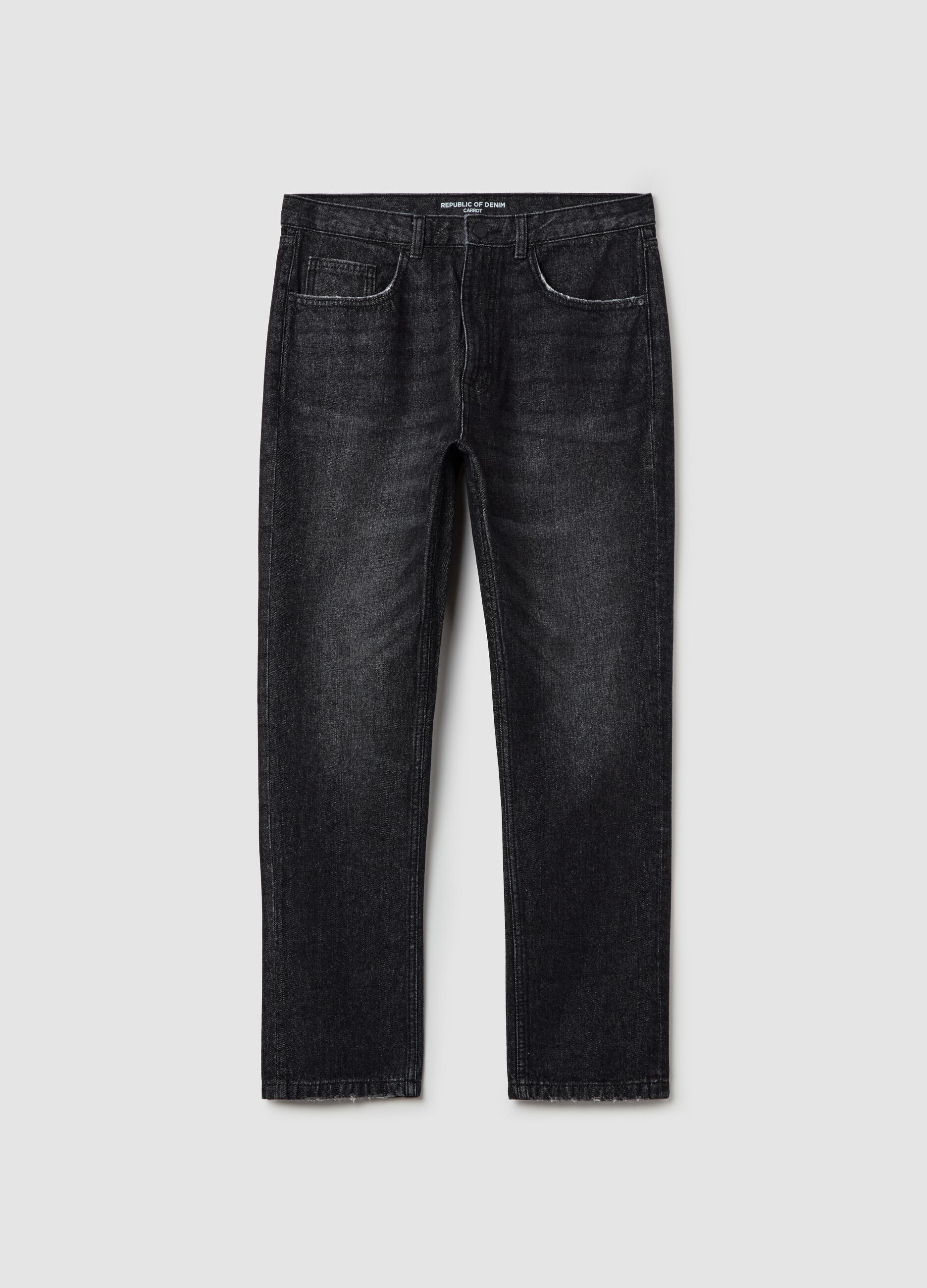 Jeans carrot fit con scoloriture