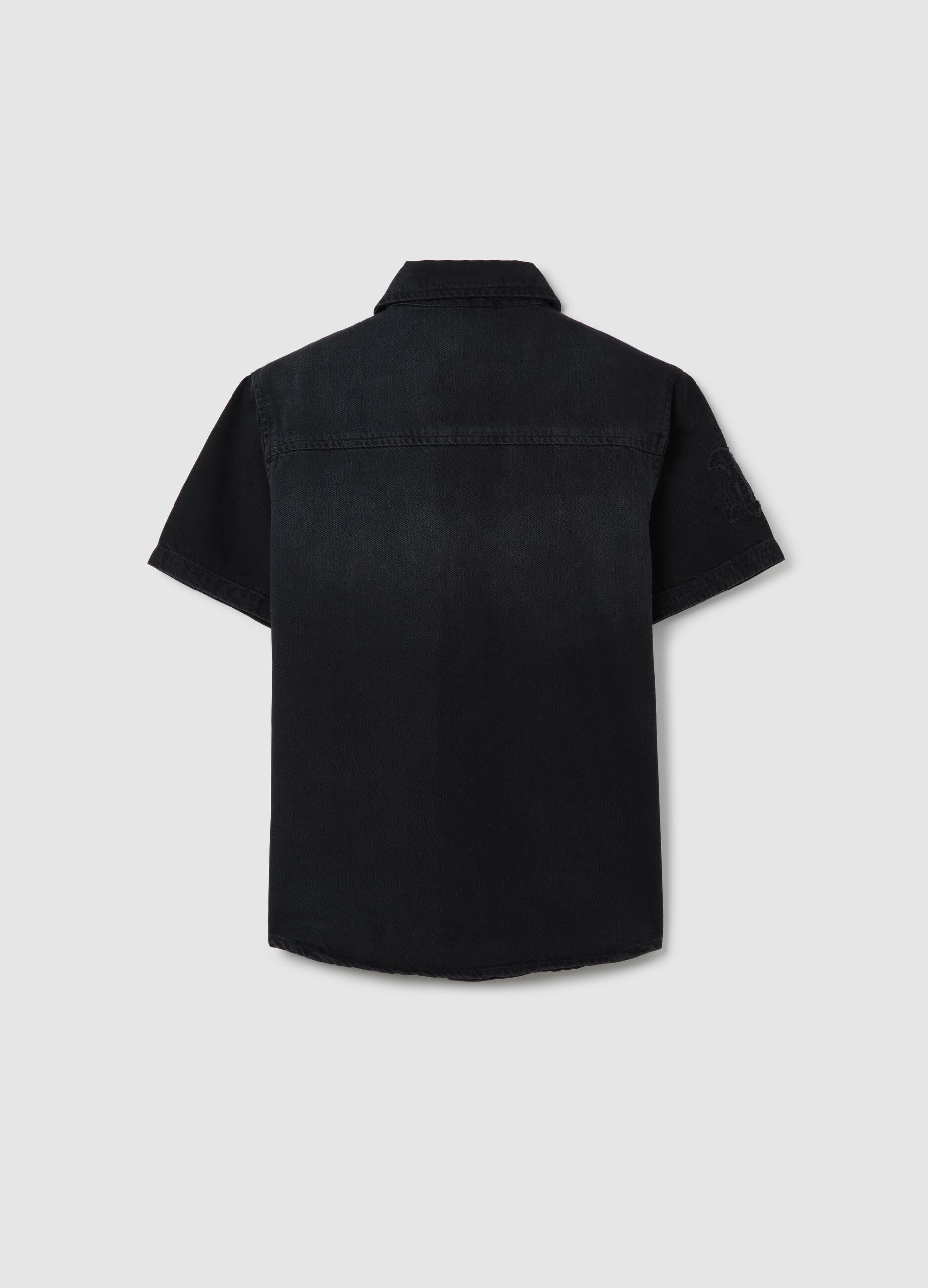 Black shirt in denim with embroidery