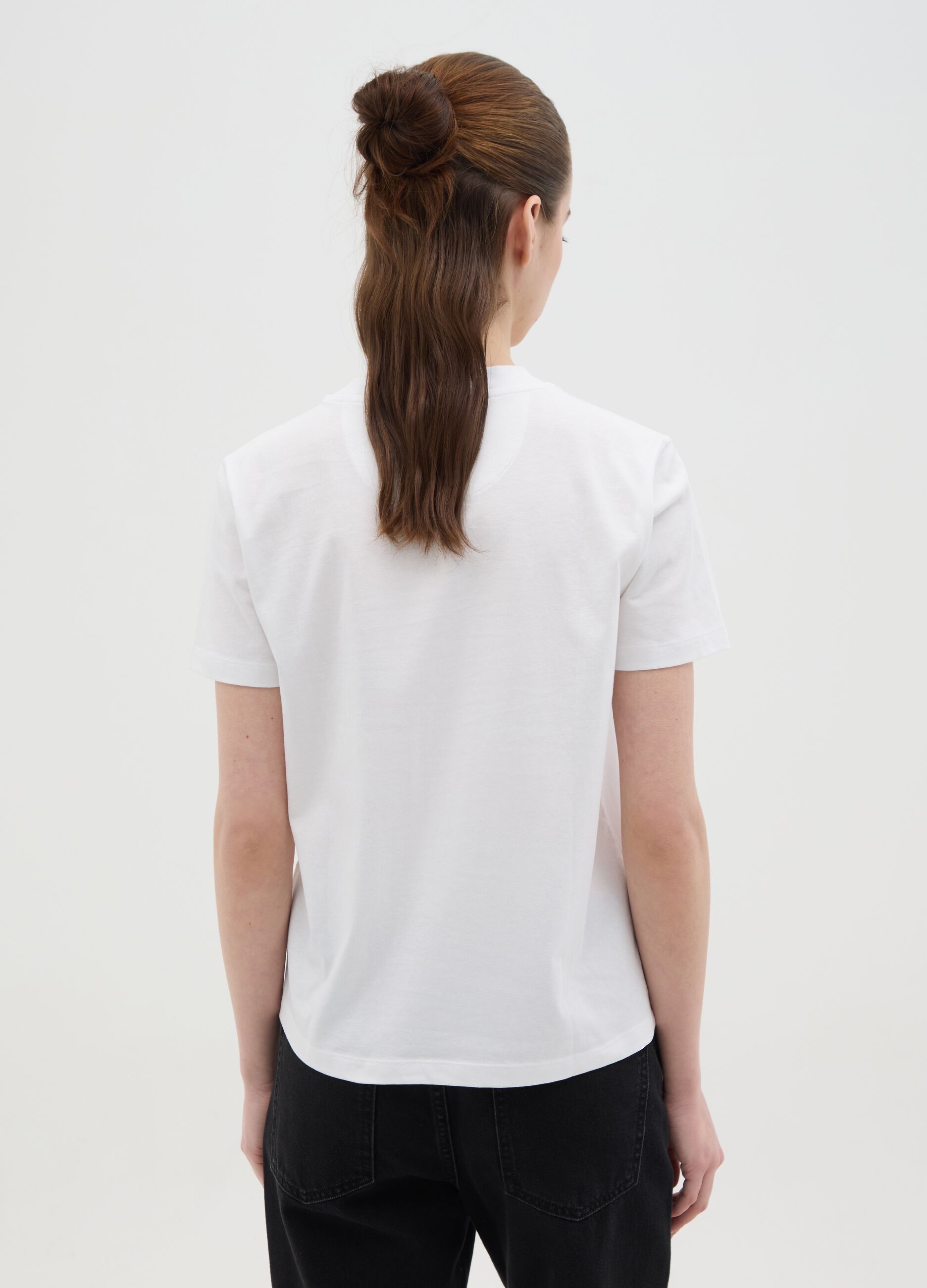 White T-shirt in cotton with lace bow
