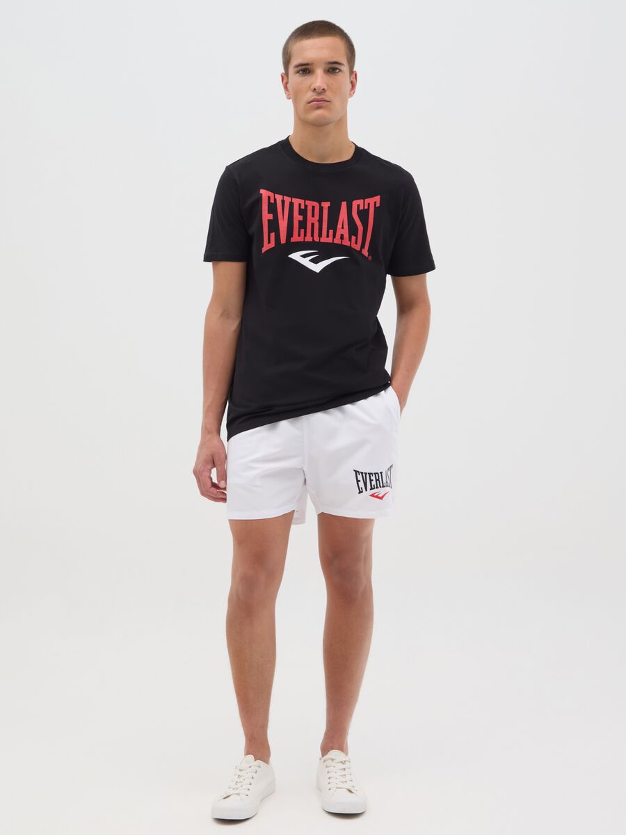 White swimming trunks with logo print_0