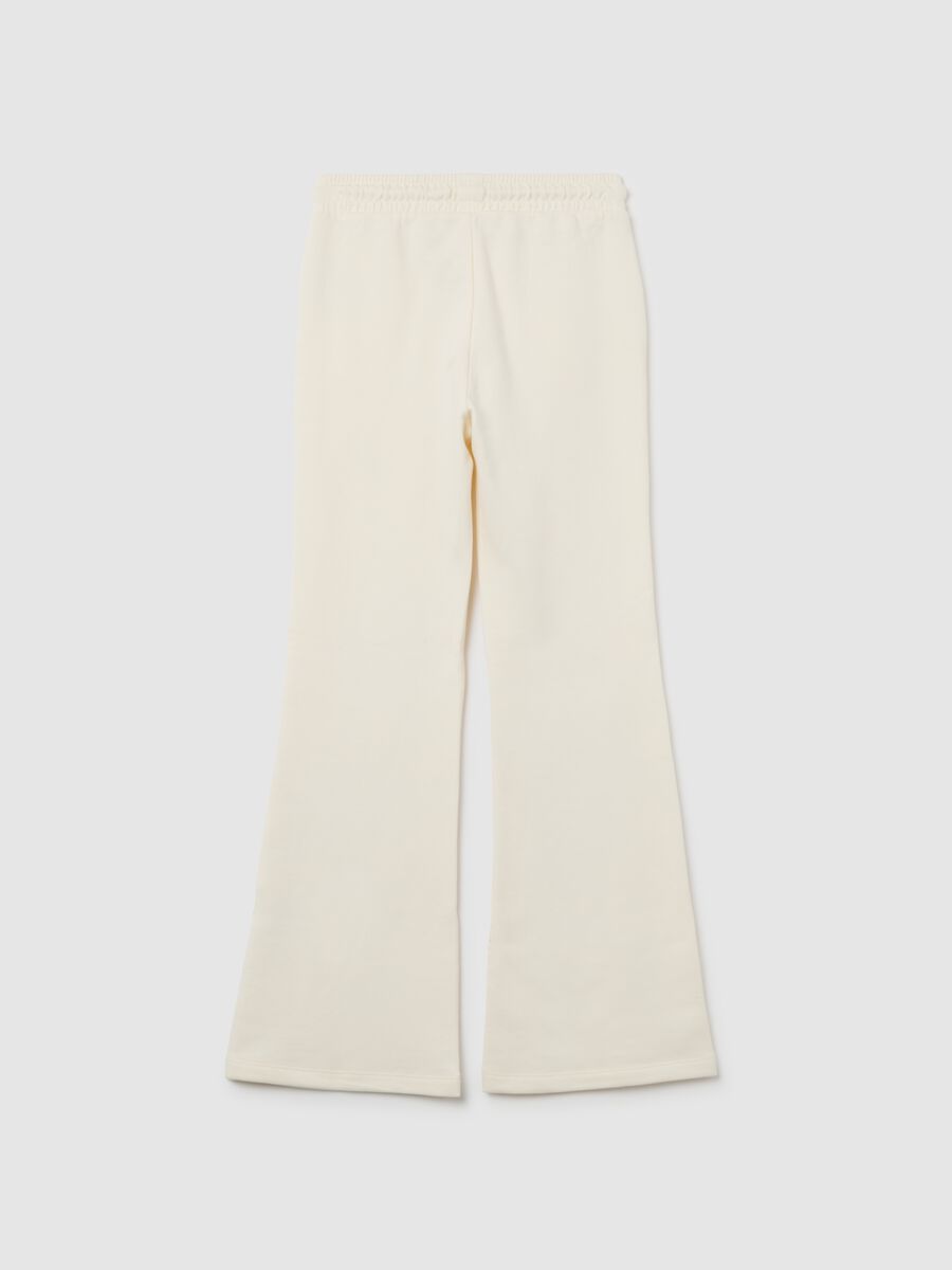 Girls' beige flare trousers in pure cotton_1