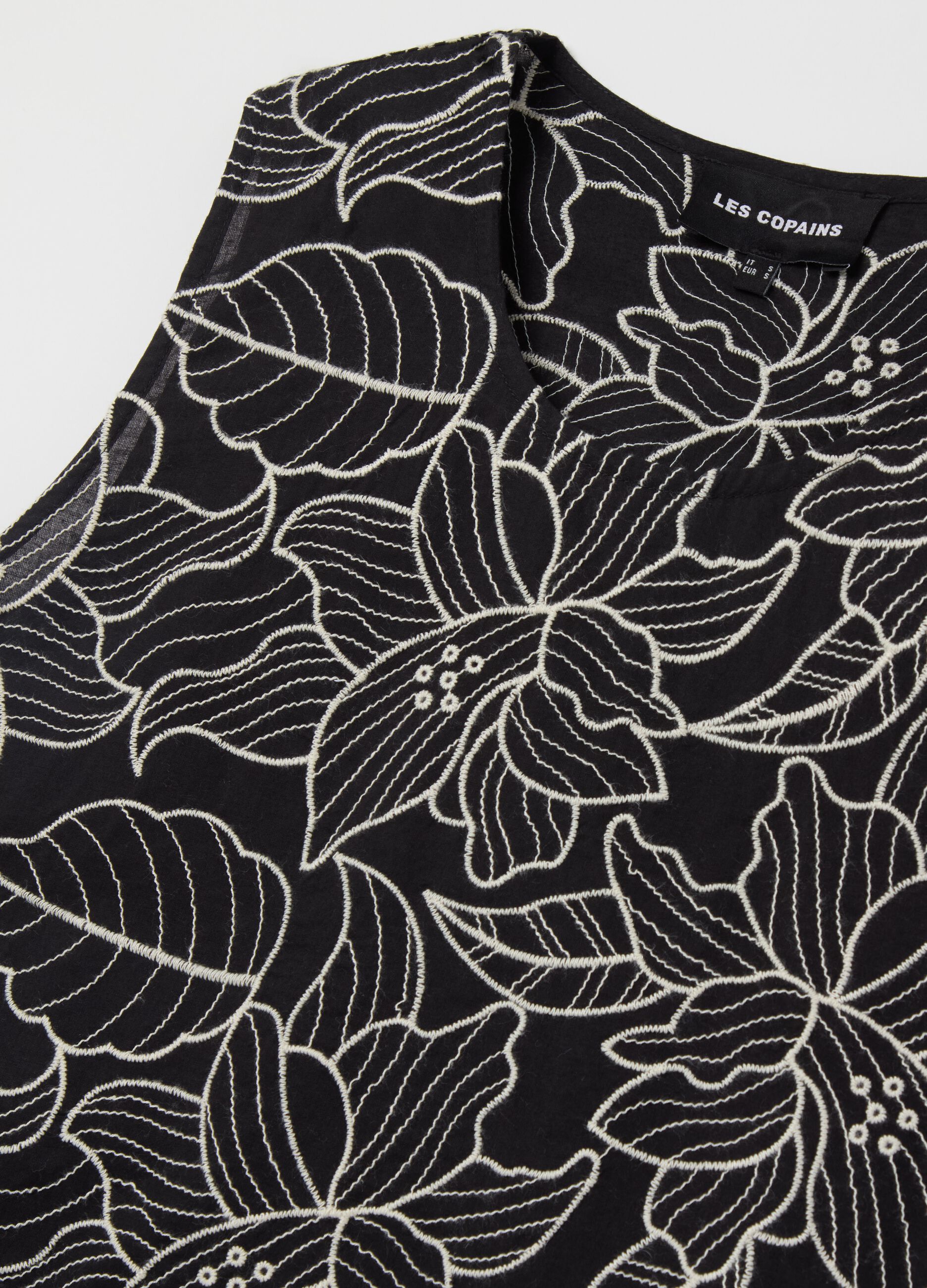 Sleeveless top with floral embroidery