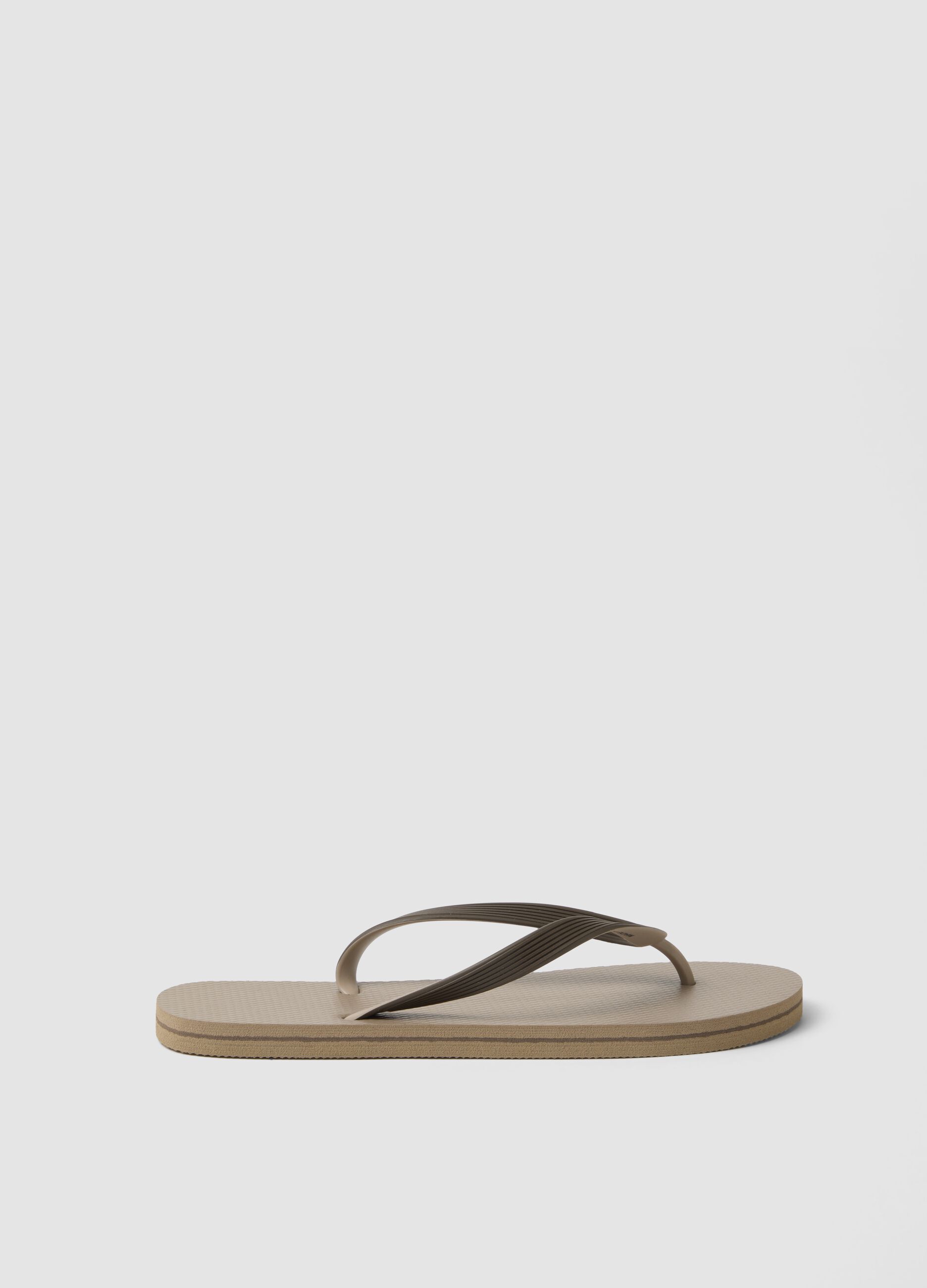 Beige beach flip-flops