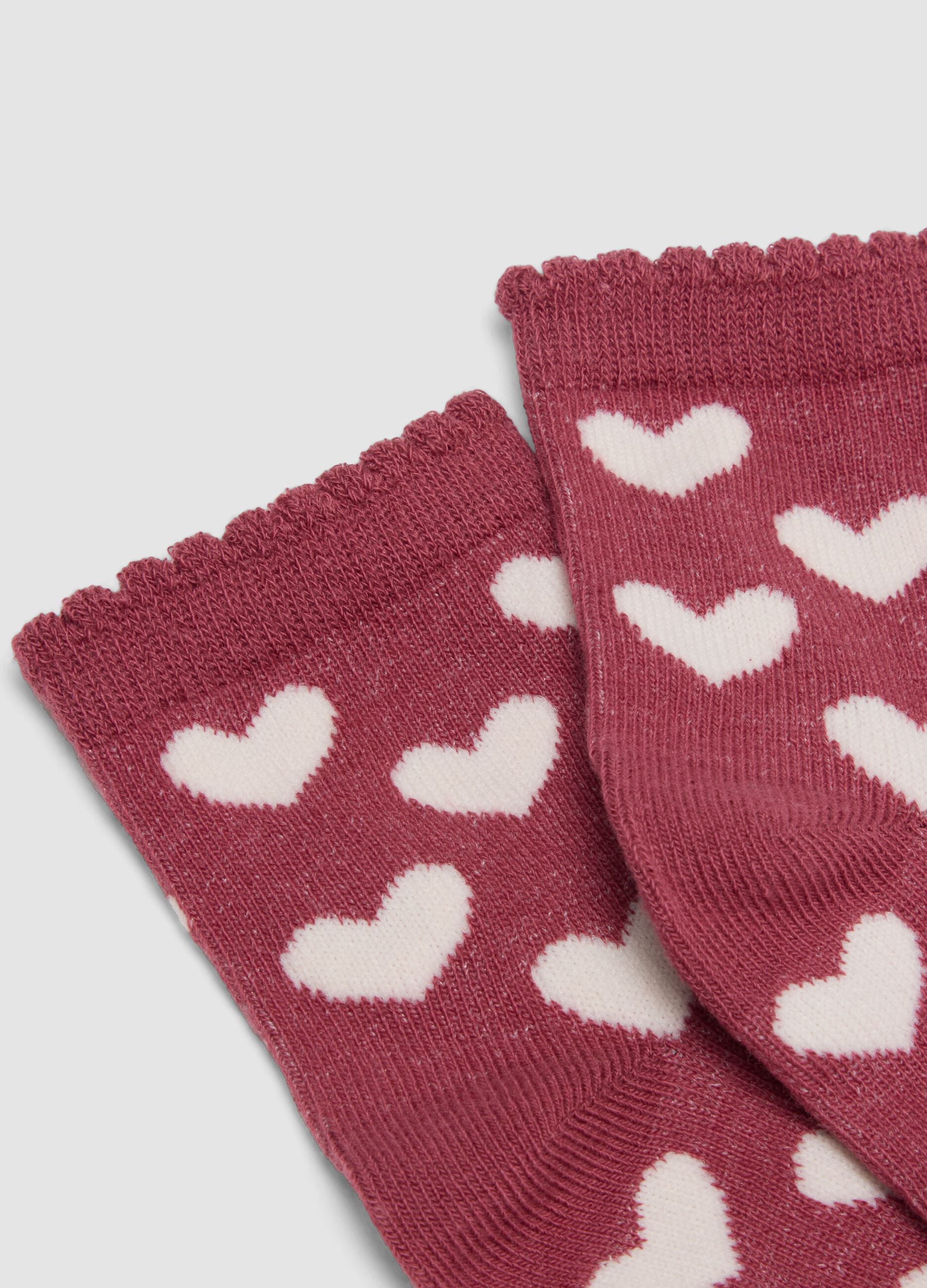 Tripack di calze rosa e rosse in cotone organico elasticizzato con fantasia