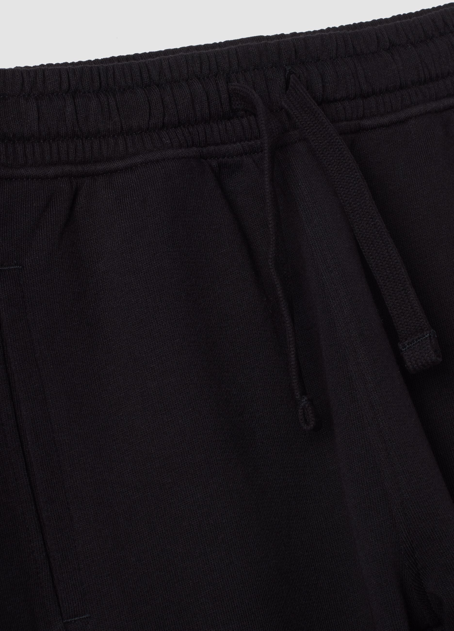 Pantaloni jogger neri in puro cotone con fondo elastico