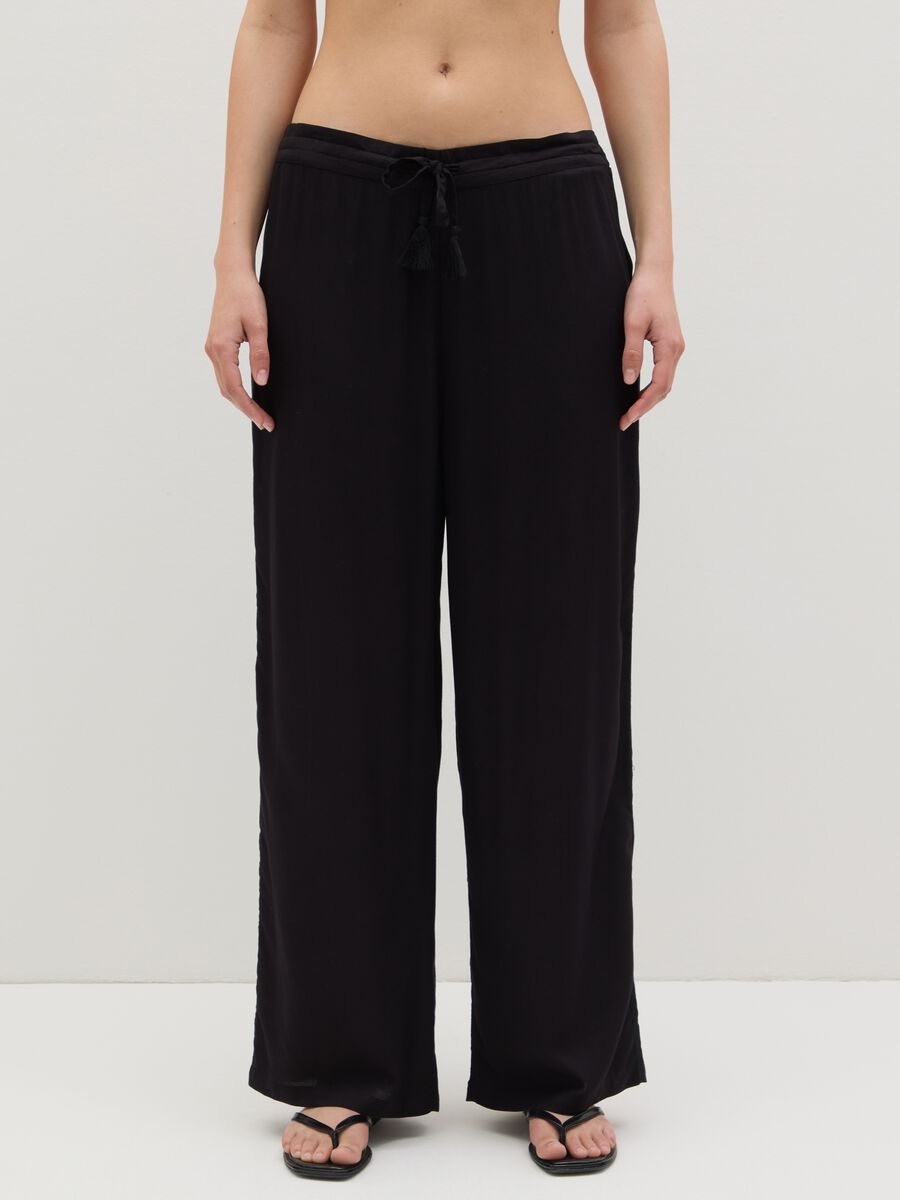 Long black beach cover-up trousers with drawstring_1