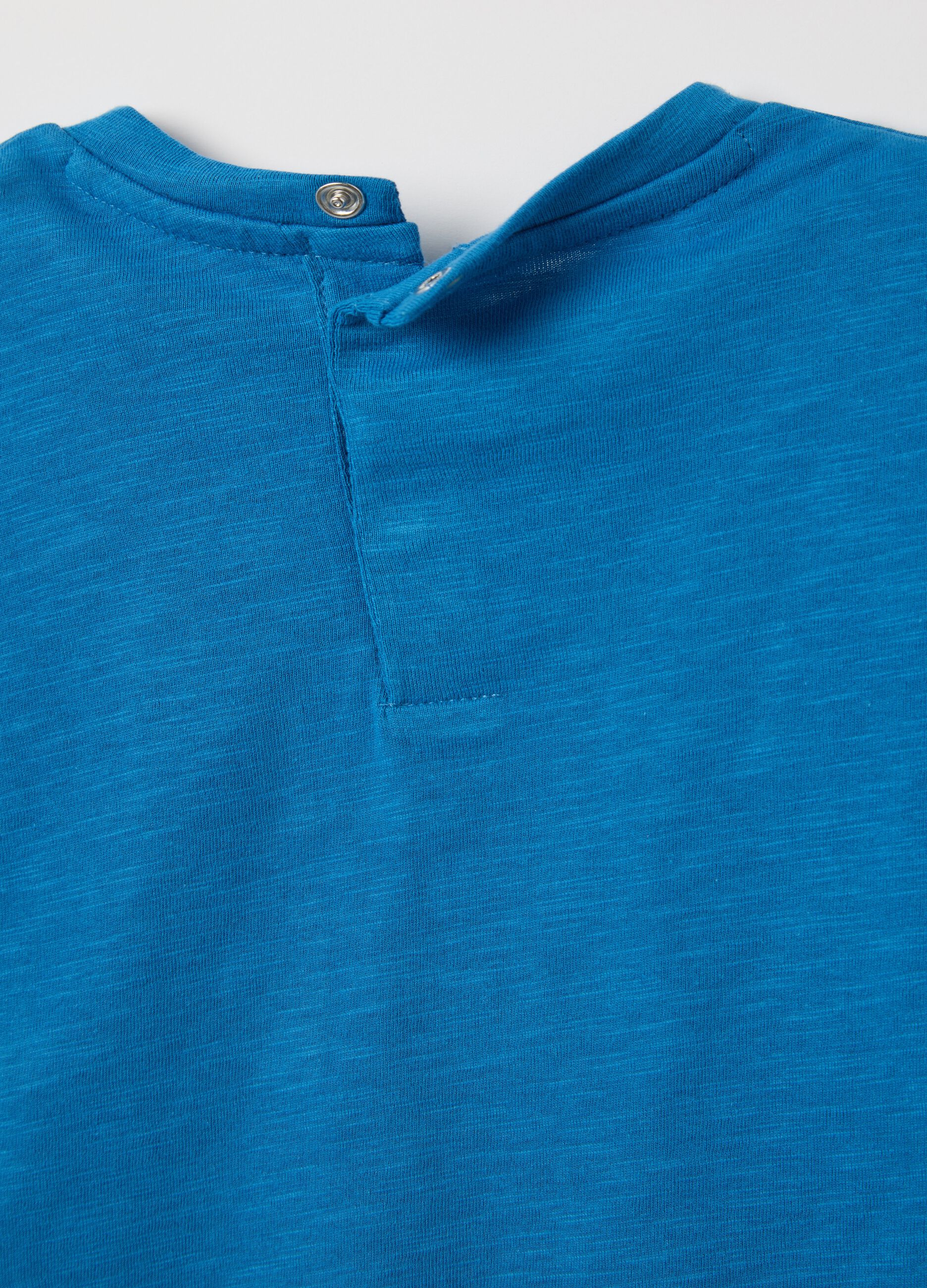 T-shirt blu in cotone bio con tasca