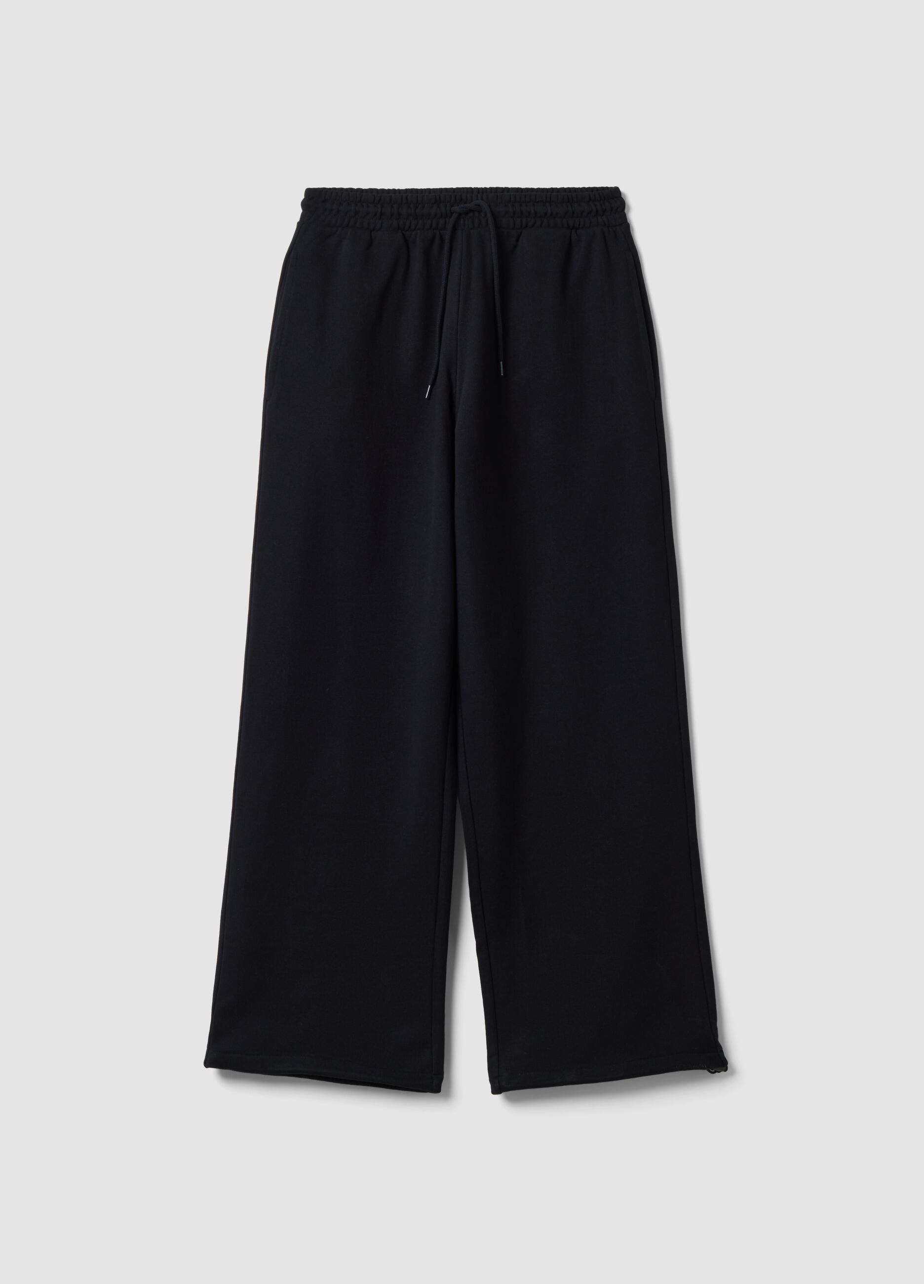 Black pure cotton joggers with elasticated waistband, oversized fit