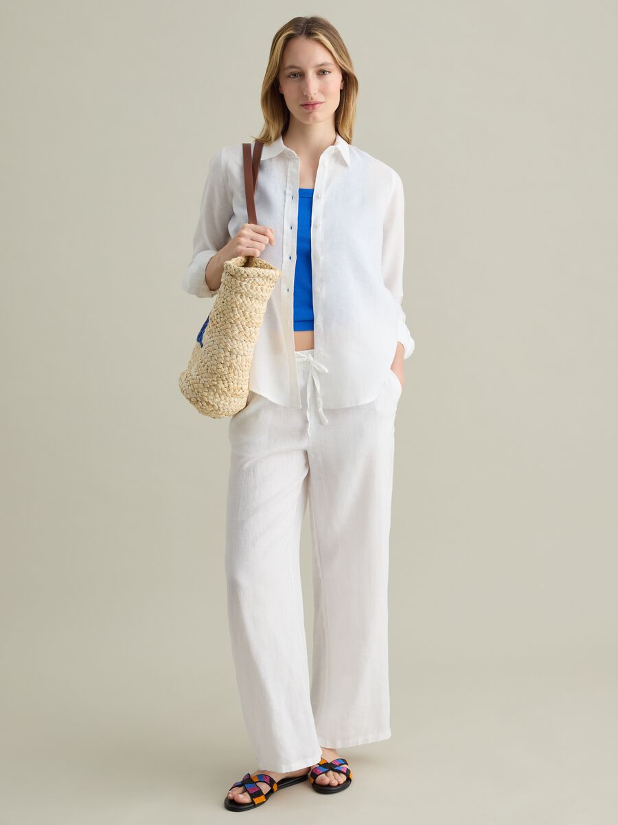White wide-leg fluid trousers in linen_0