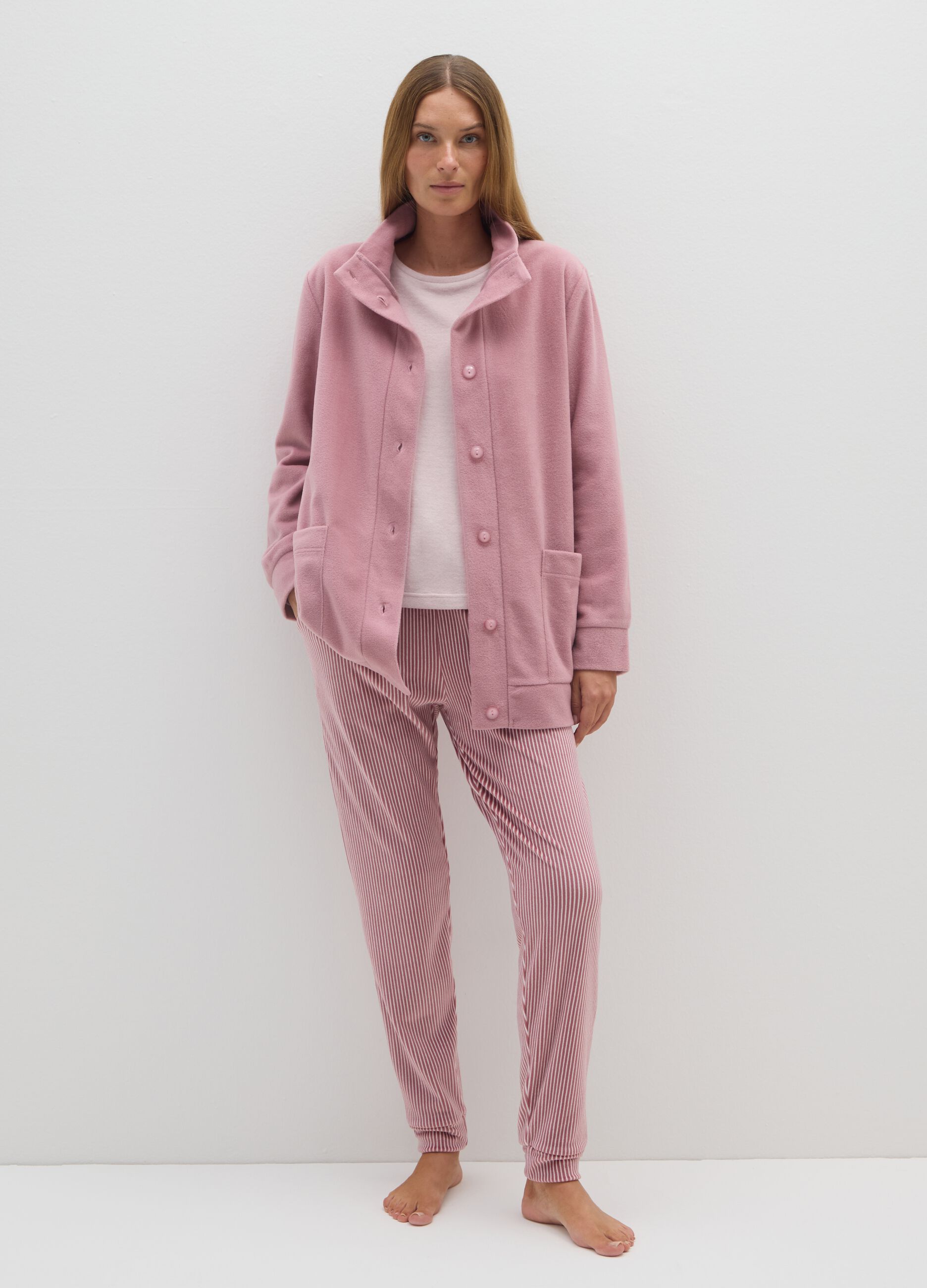 Pink fleece dressing gown with buttons and pockets