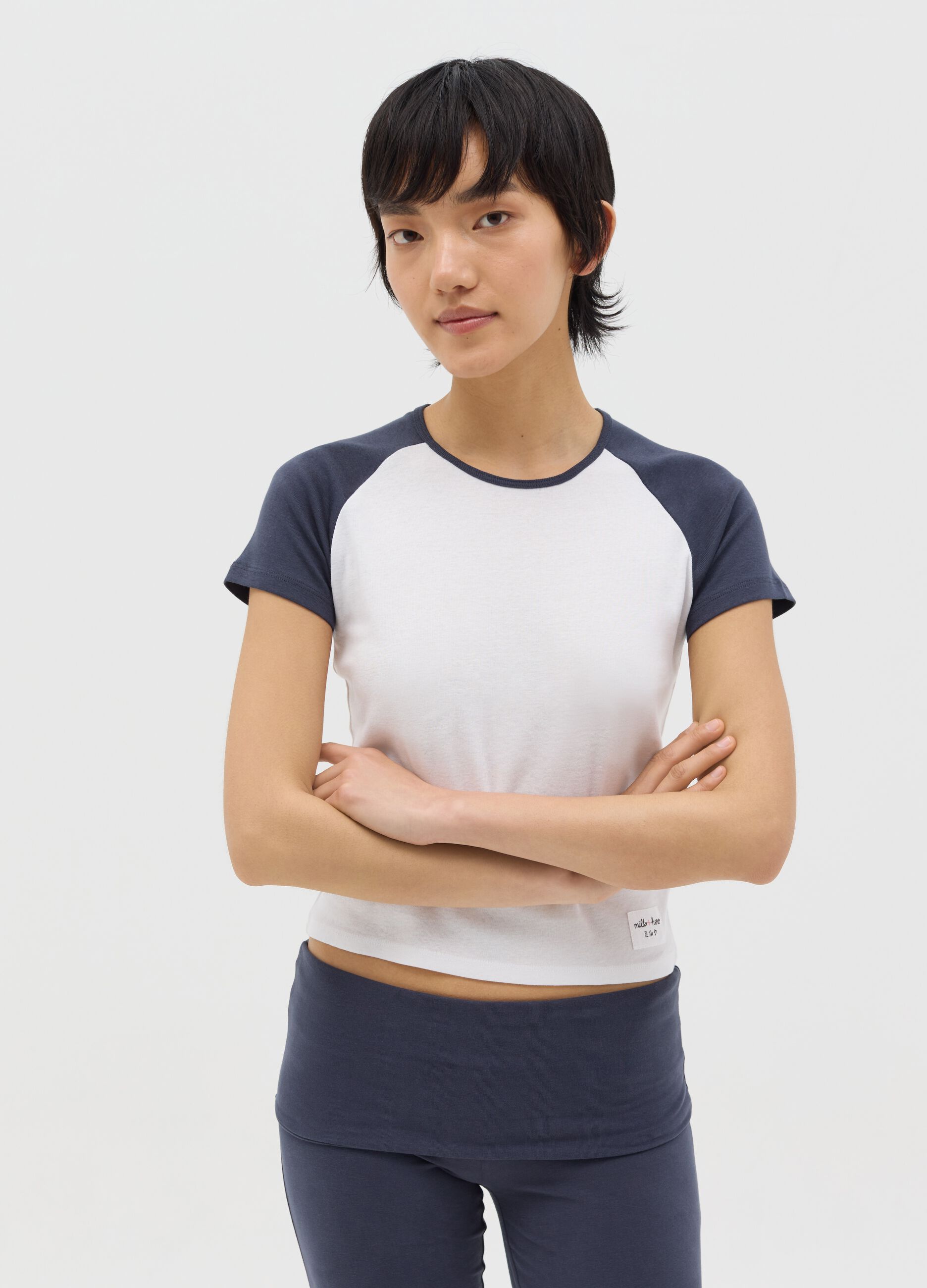 White T-shirt with blue raglan sleeves