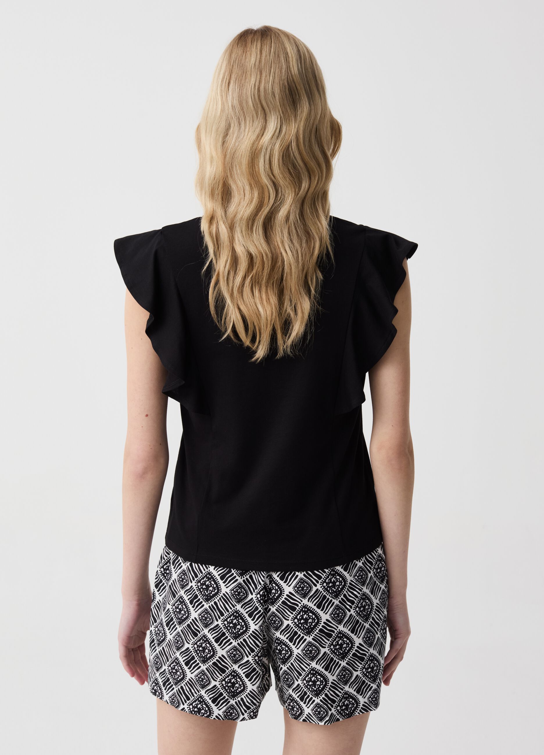 Sleeveless T-shirt with V neck and flounce