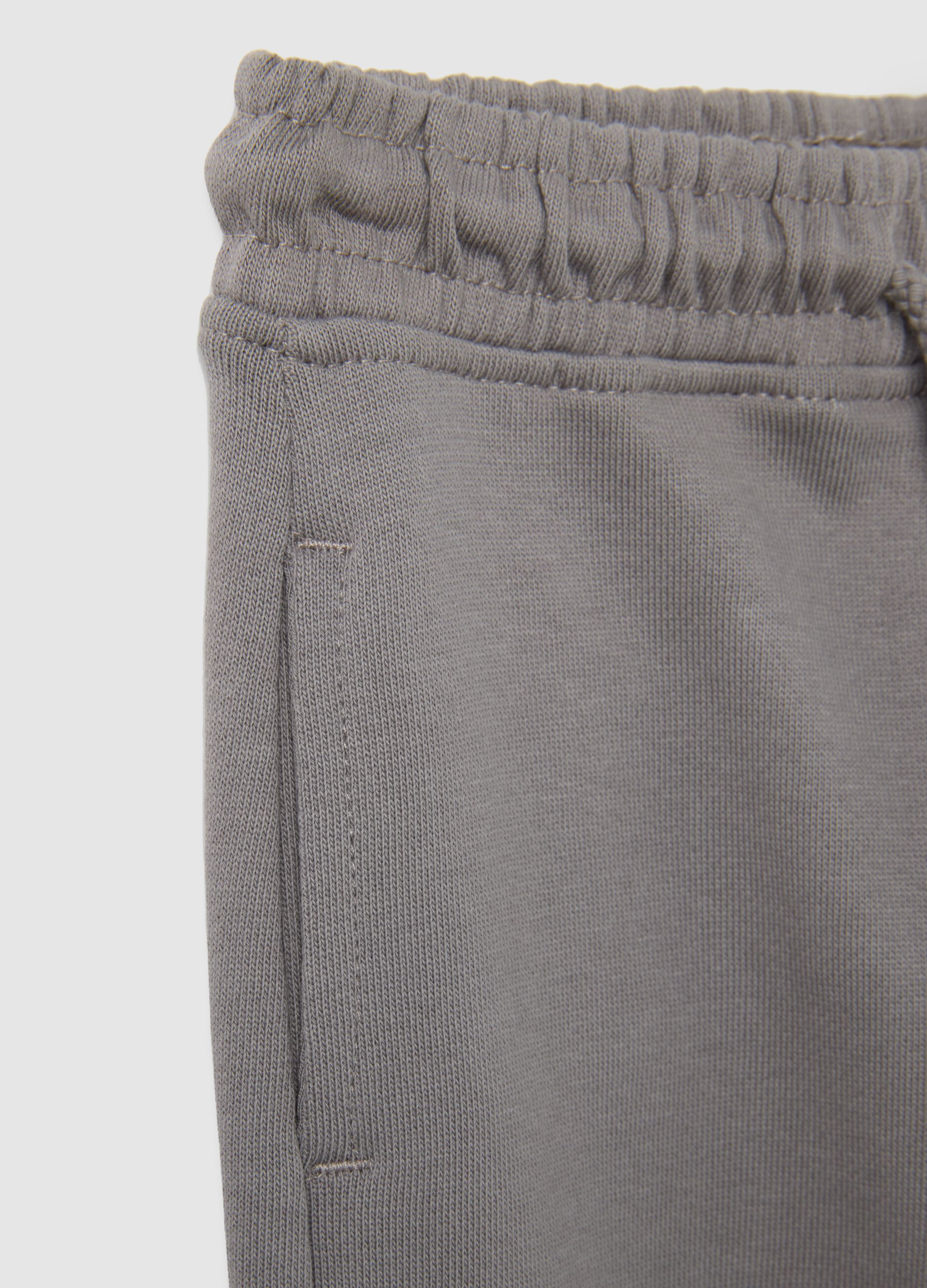 Baby trousers in pure grey cotton with regular fit