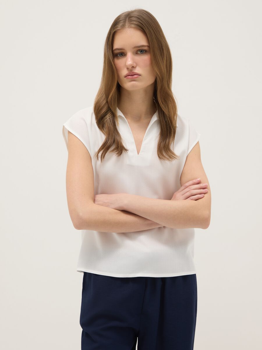 Camicetta senza maniche in pura viscosa bianca regular fit con scollo a V_0