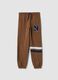 Pantaloni jogger marroni in puro cotone con bande a contrasto_0