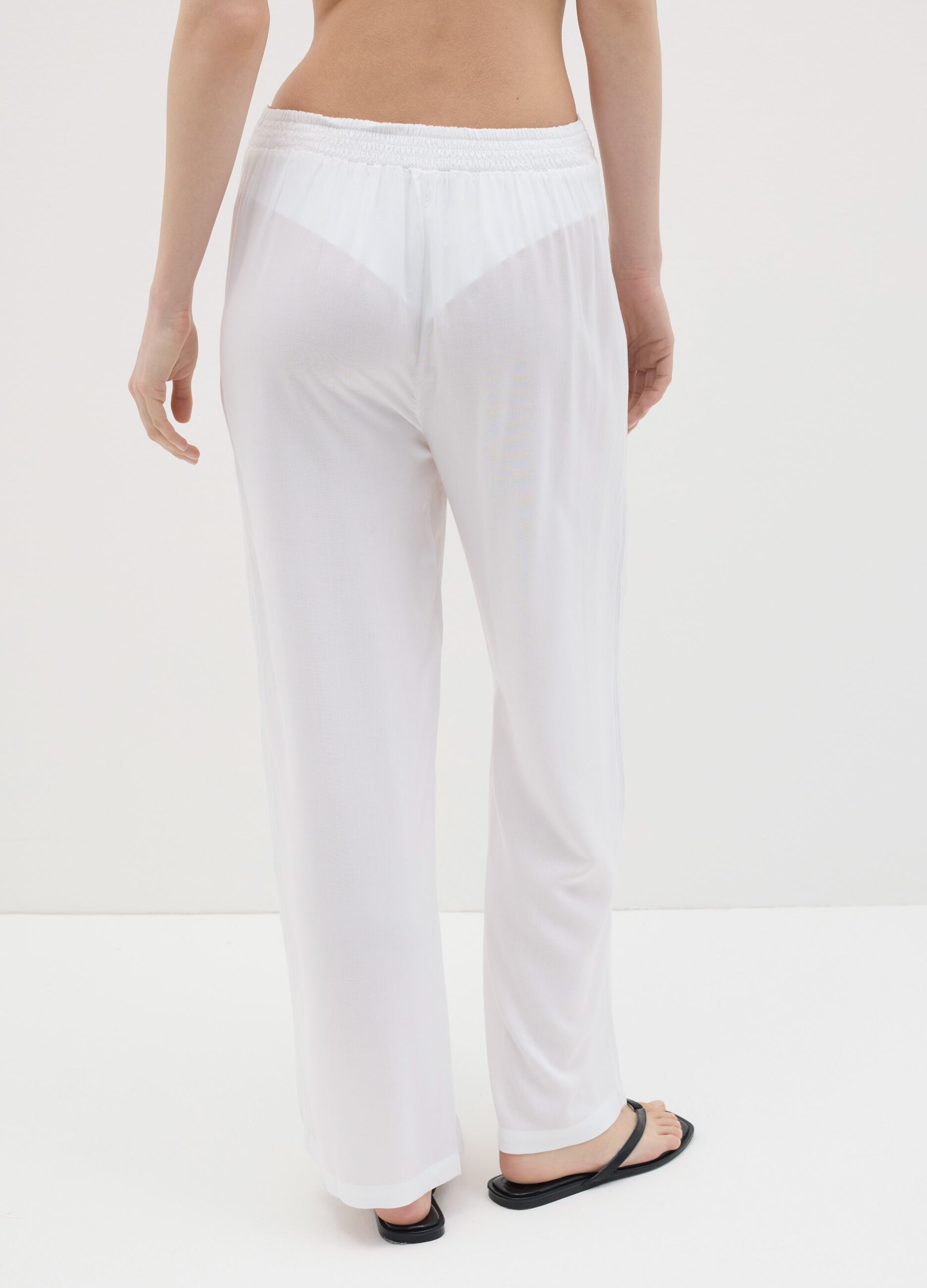 Long white beach cover-up trousers with drawstring