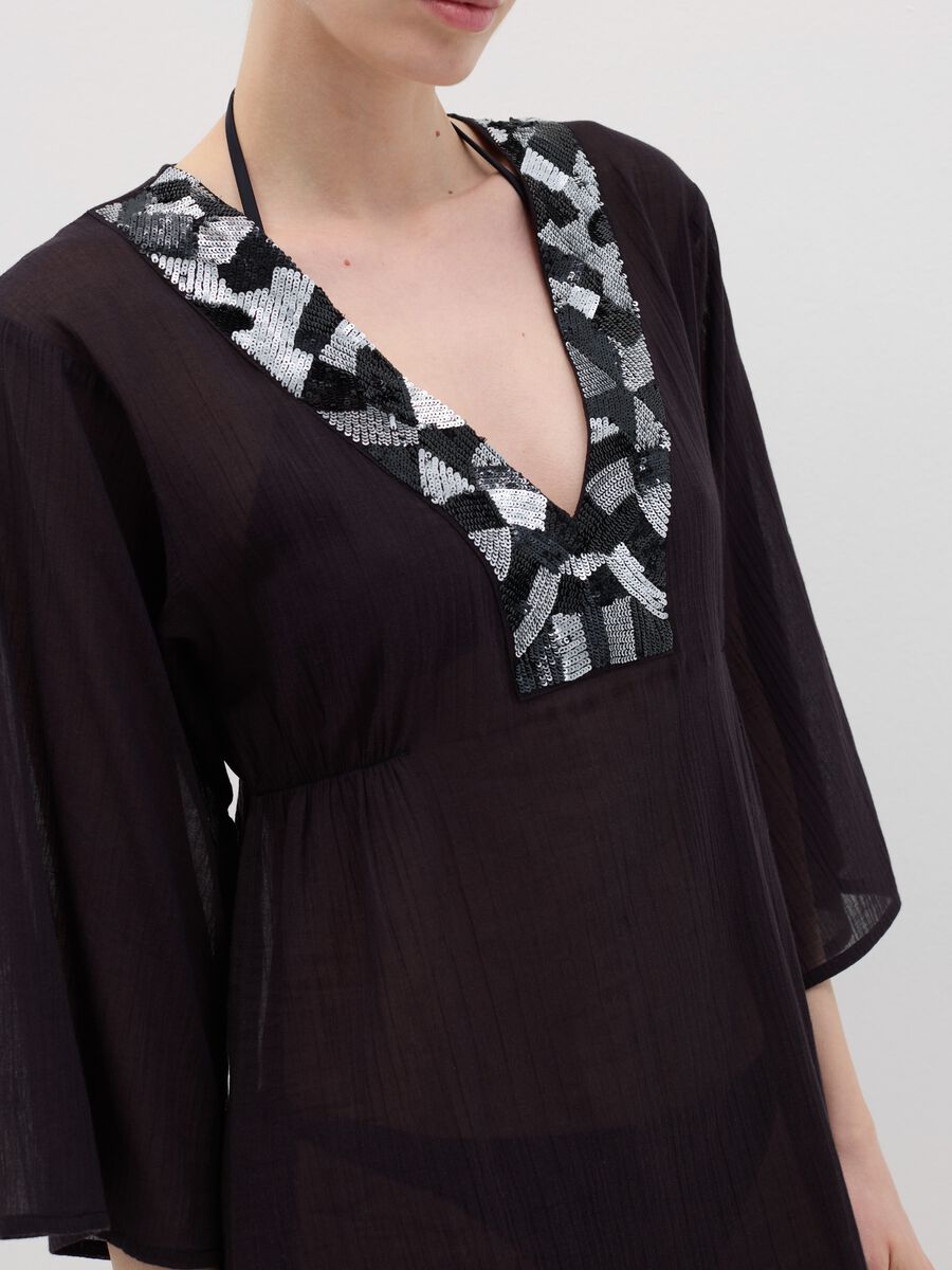 Black beach cover-up with decorative edging_2