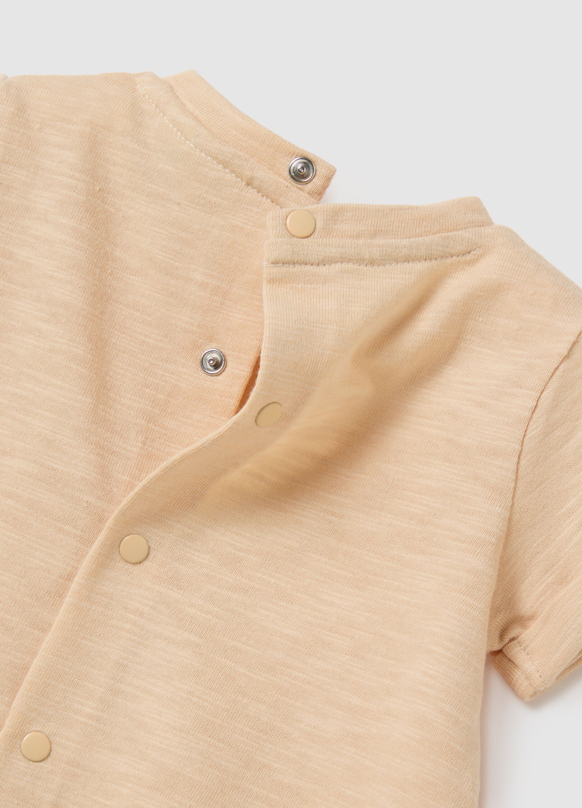 Tutina da neonato in puro cotone beige con stampa