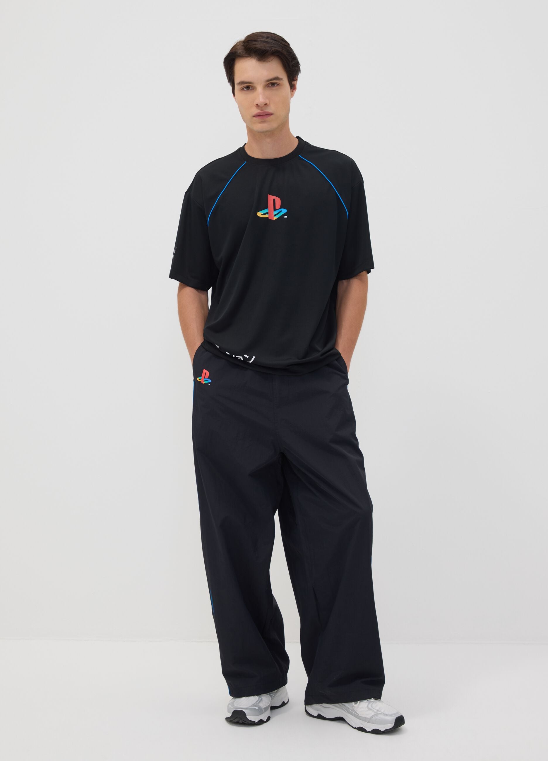 Black PlayStation fitness trousers with contrast piping