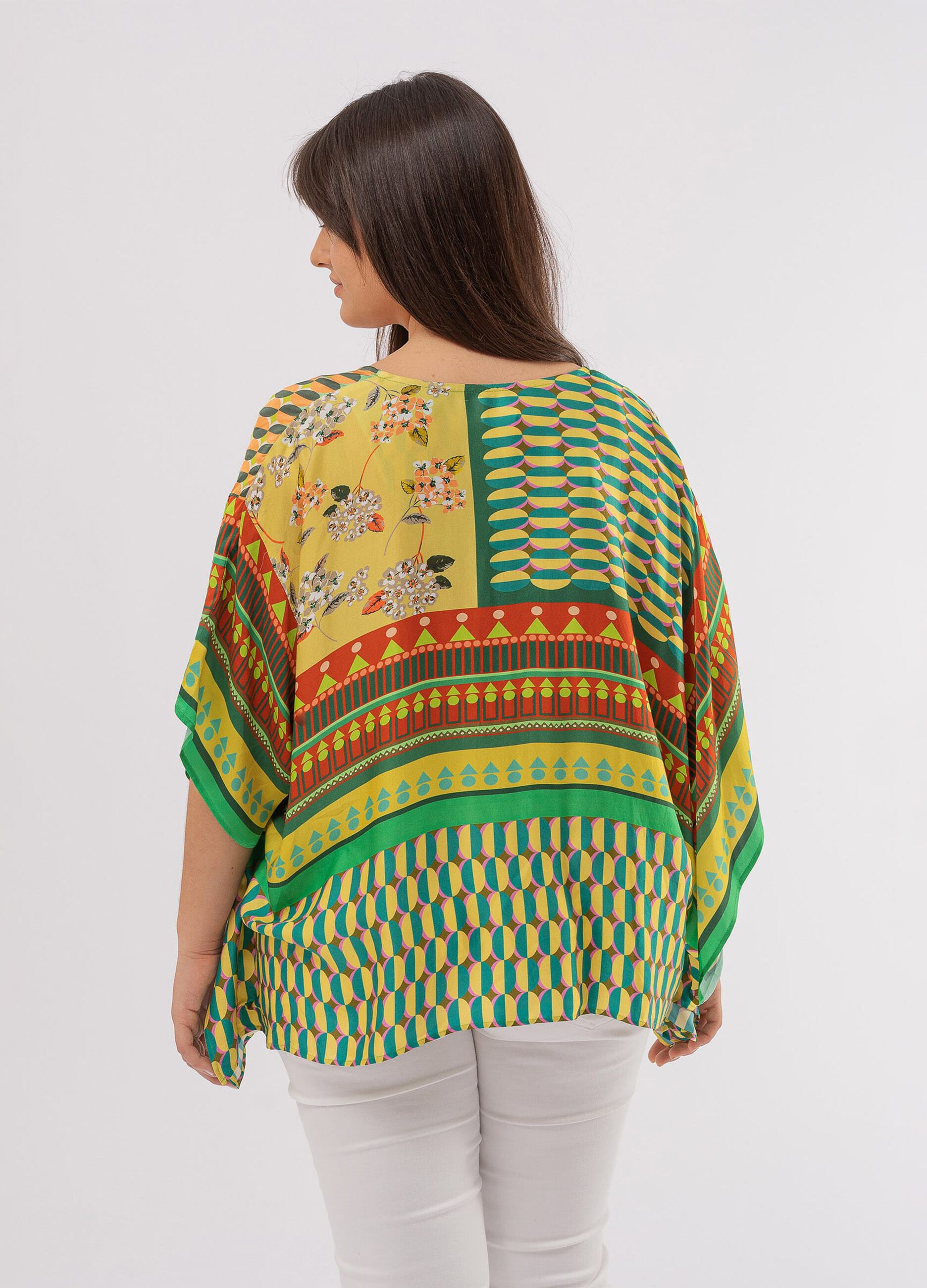 Curvy poncho with ring and multicoloured print