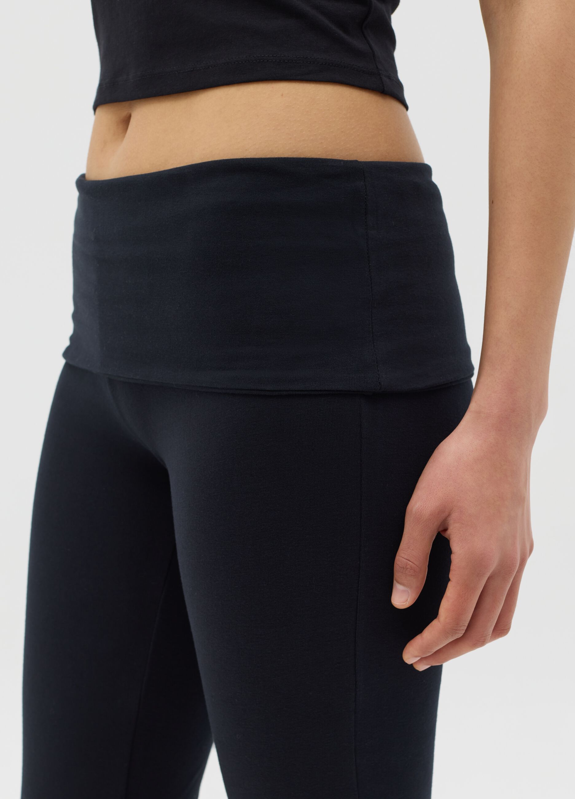 Black flare-fit leggings with striped fold at the waist