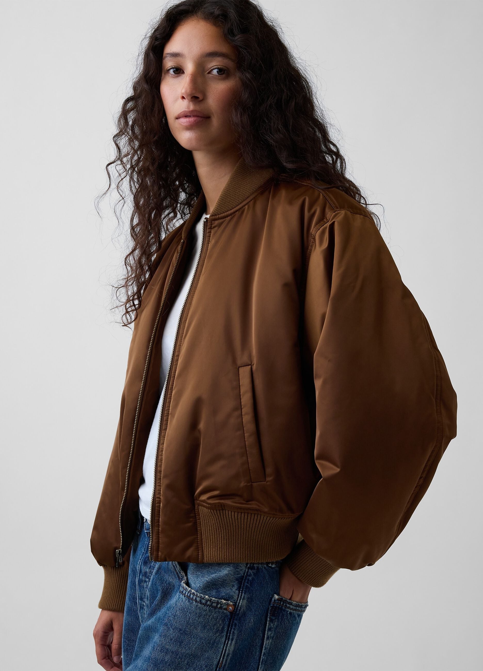 Light brown bomber jacket with zip and ribbed cuffs