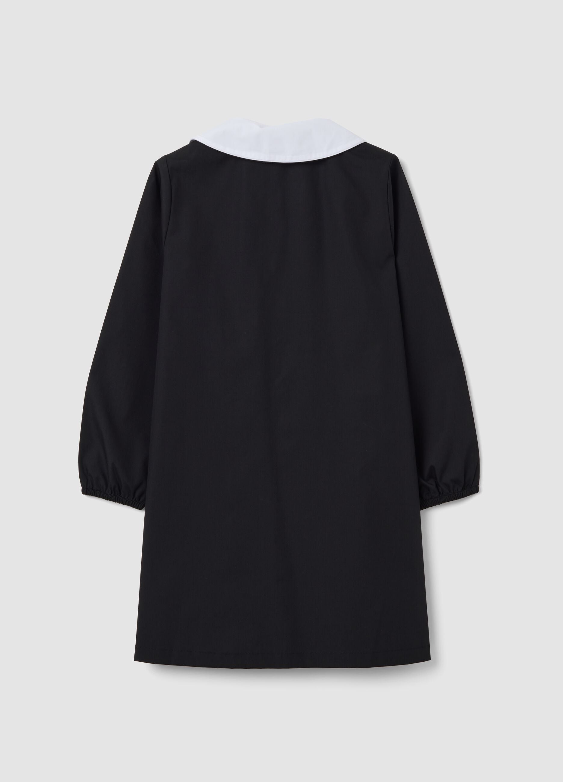 Black girls&rsquo; school apron with zip and white collar, Stitch embroidery