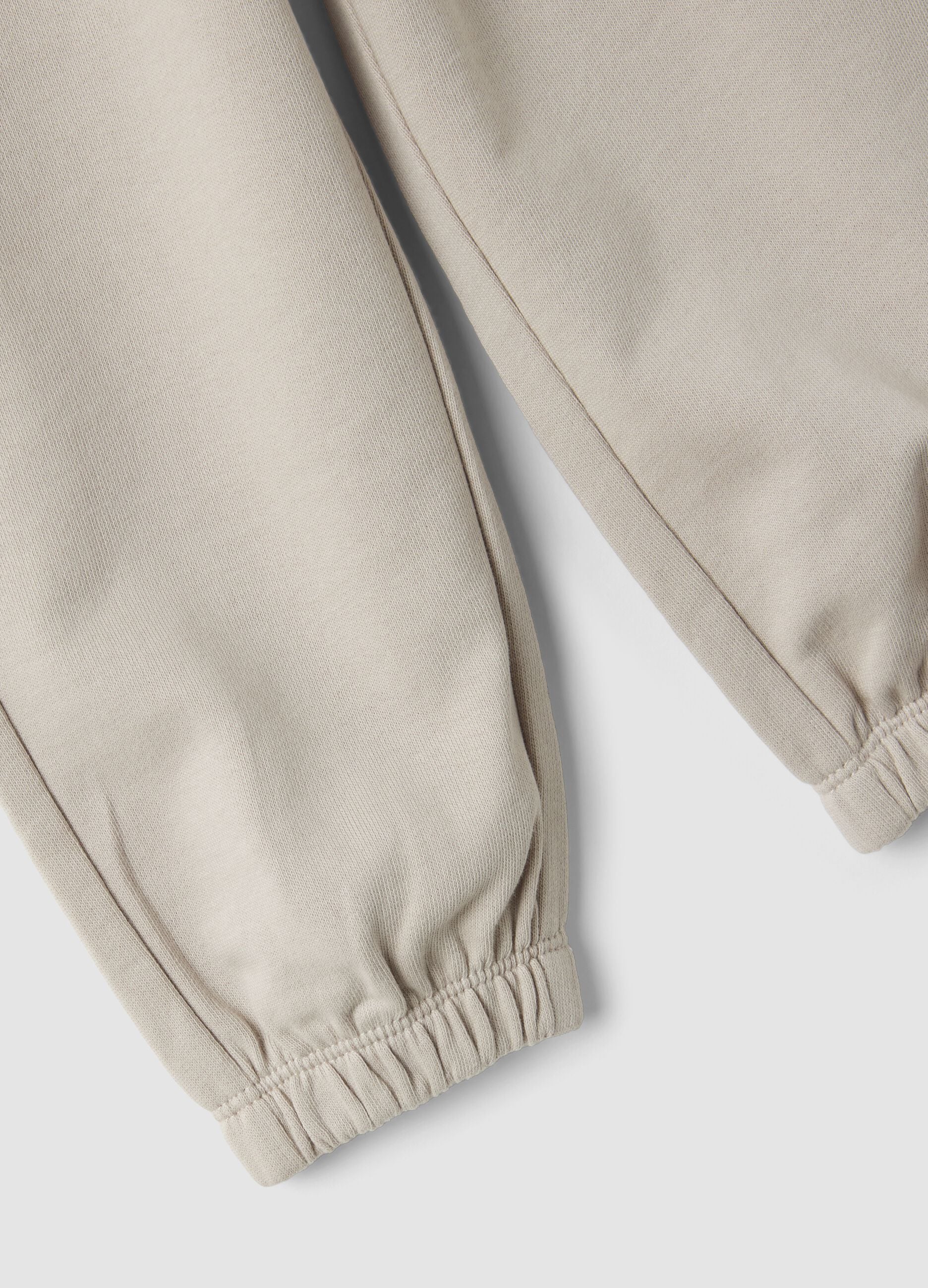 Grey jogger trousers in pure organic cotton with drawstring for baby boy