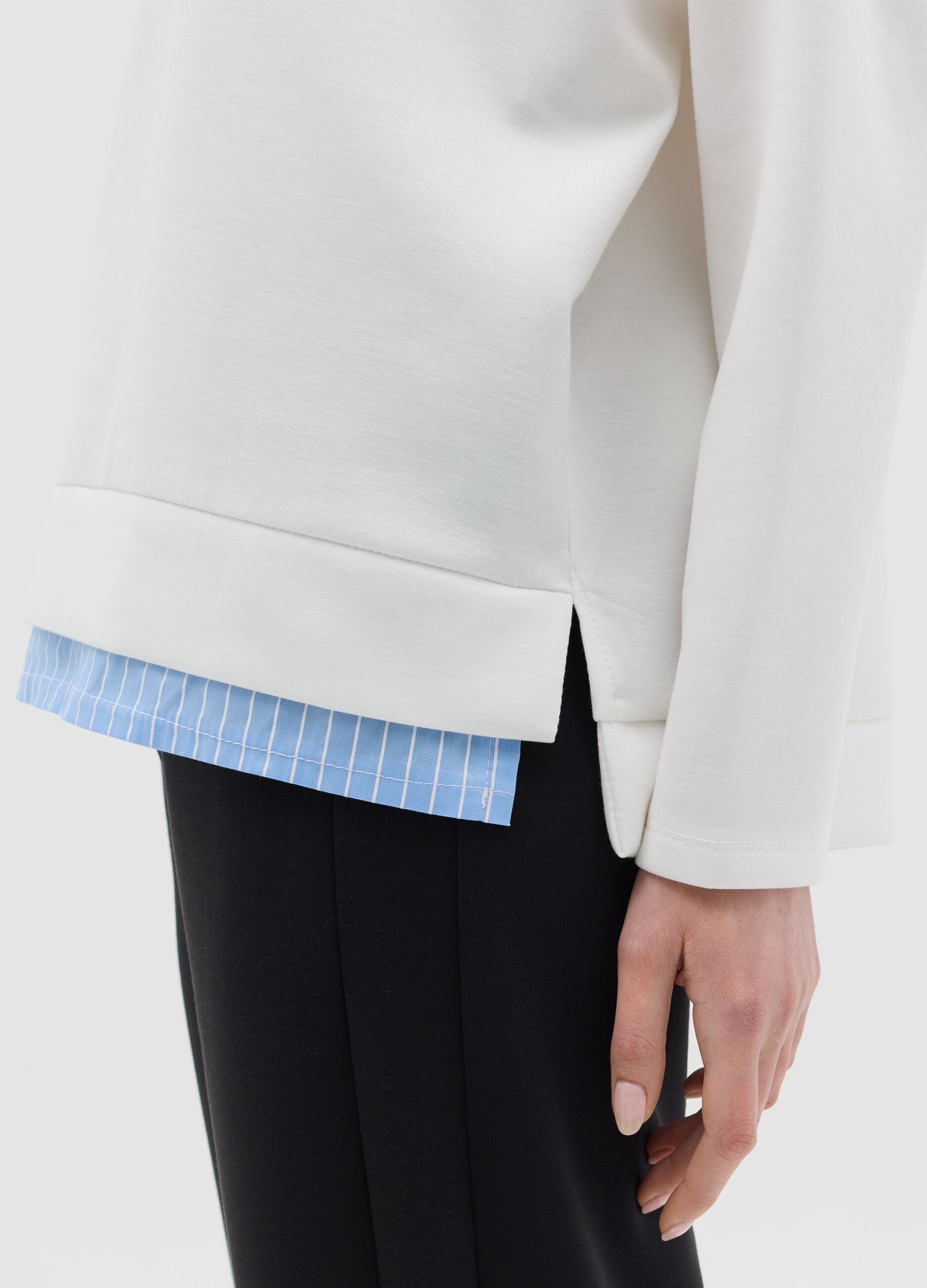 White top with layered-effect hem