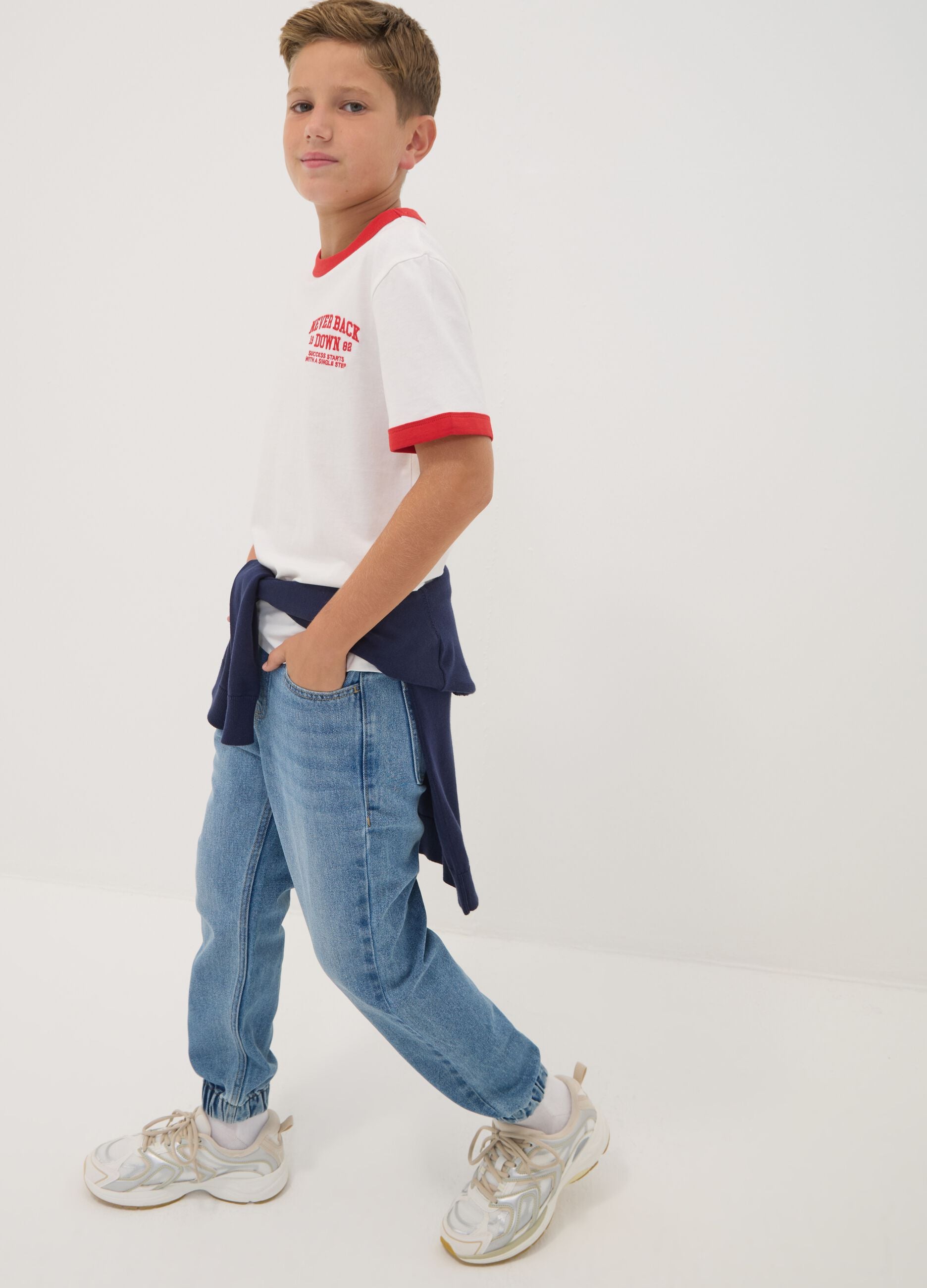 Blue denim jogger jeans in a cotton and viscose blend for boys